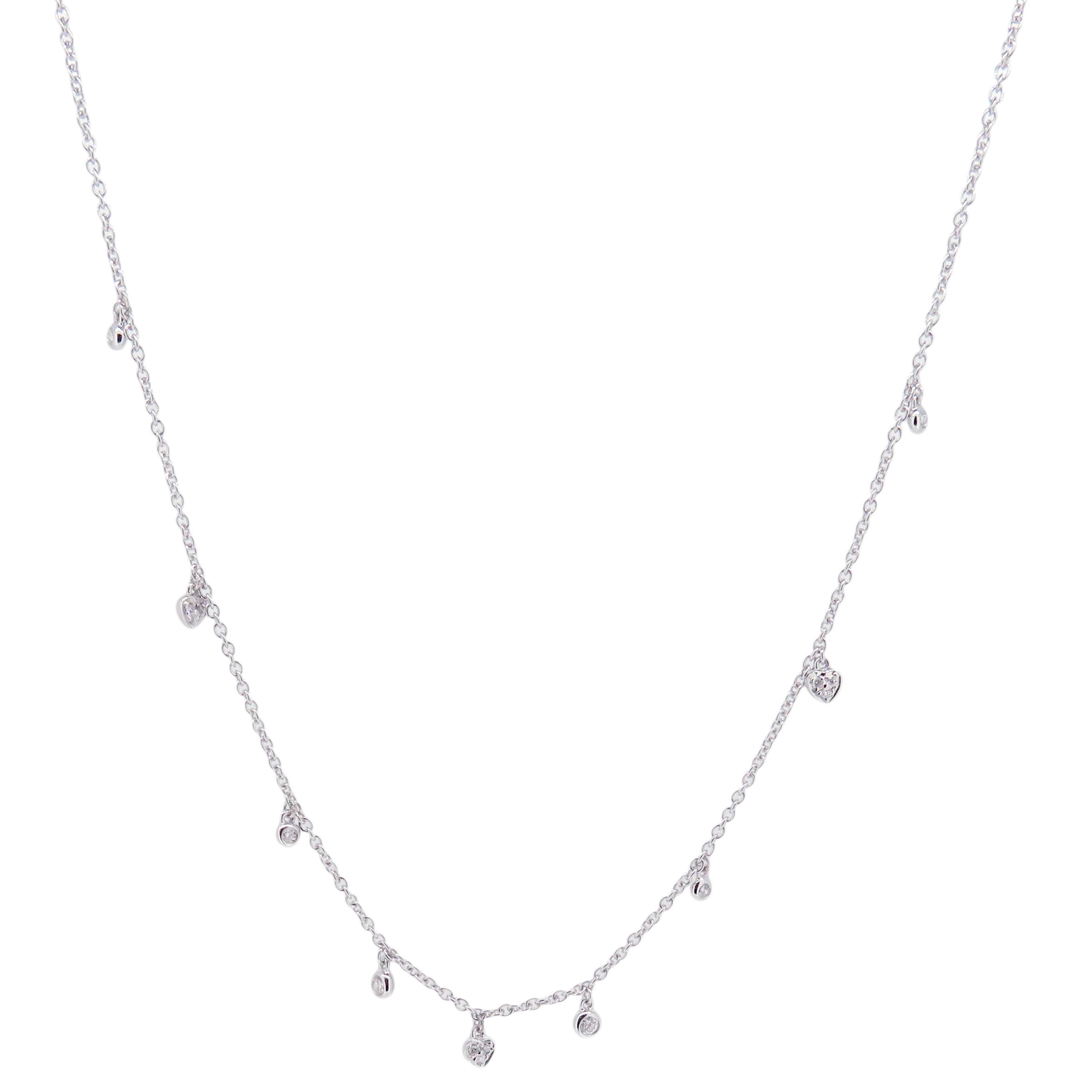 This delicate necklace is crafted in 18-karat white gold, weighing approximately 0.11 total carats of SI-H Quality white diamonds. 

Necklace is 16