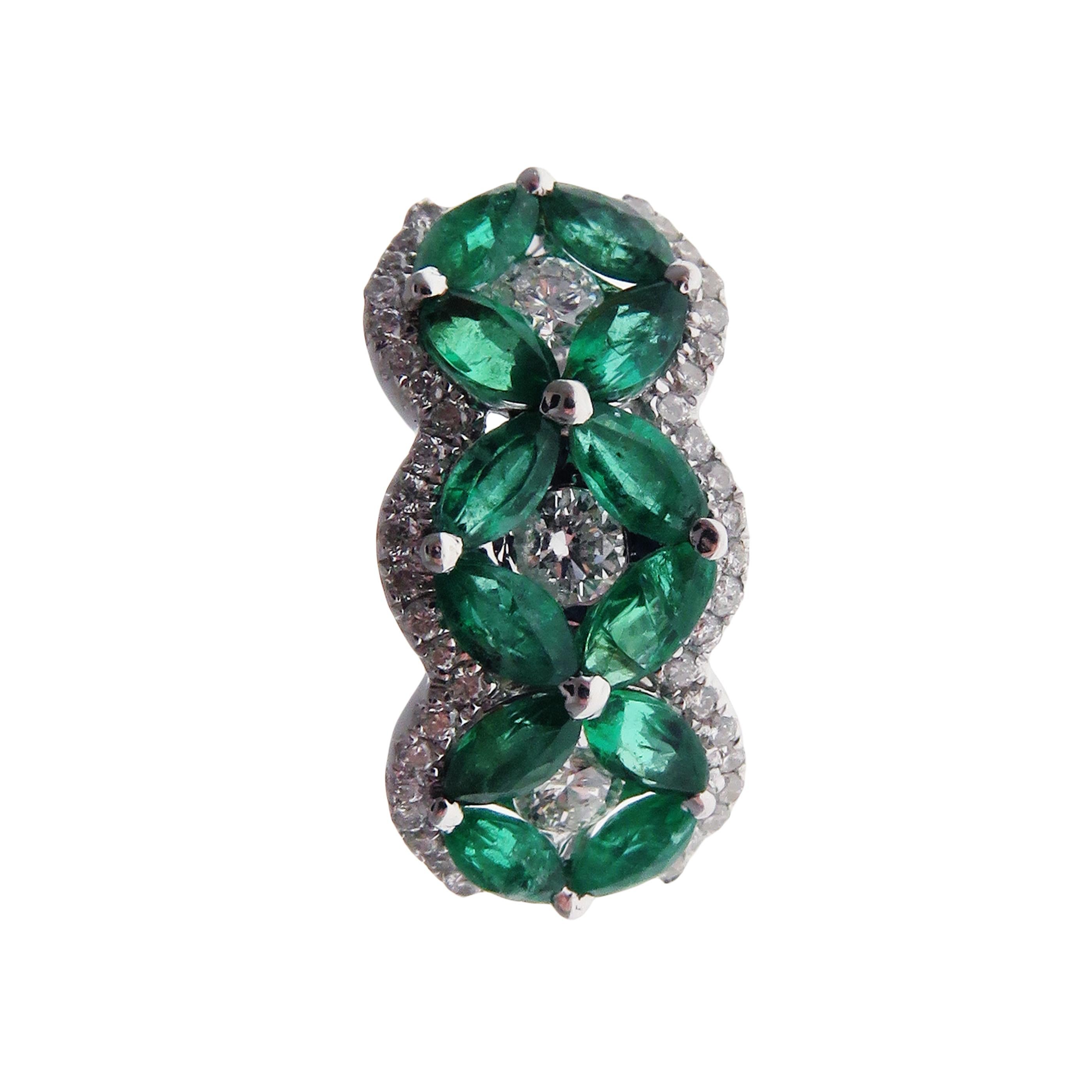 These small sized emerald huggy studs are crafted in 18-karat white gold, weighing approximately 0.70 total carats of SI-H Quality white diamond and 1.90 total carats of emerald stones. Post-style backing. 

Our Color Stone Collection features a