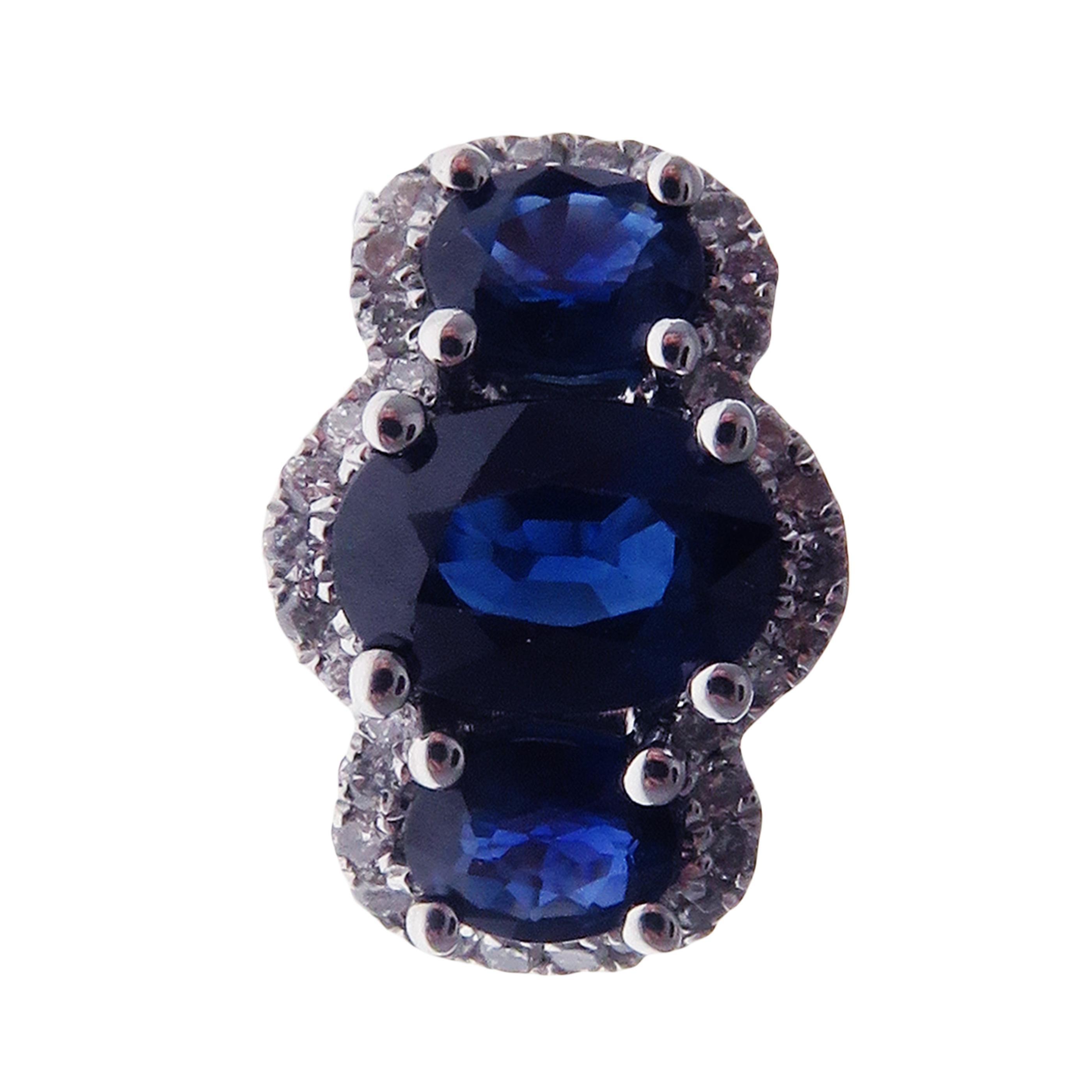 These small sized sapphire huggy studs are crafted in 18-karat white gold, weighing approximately 0.20 total carats of SI-H Quality white diamond and 2.00 total carats of sapphire stones. Post-style backing. 

Our Color Stone Collection features a