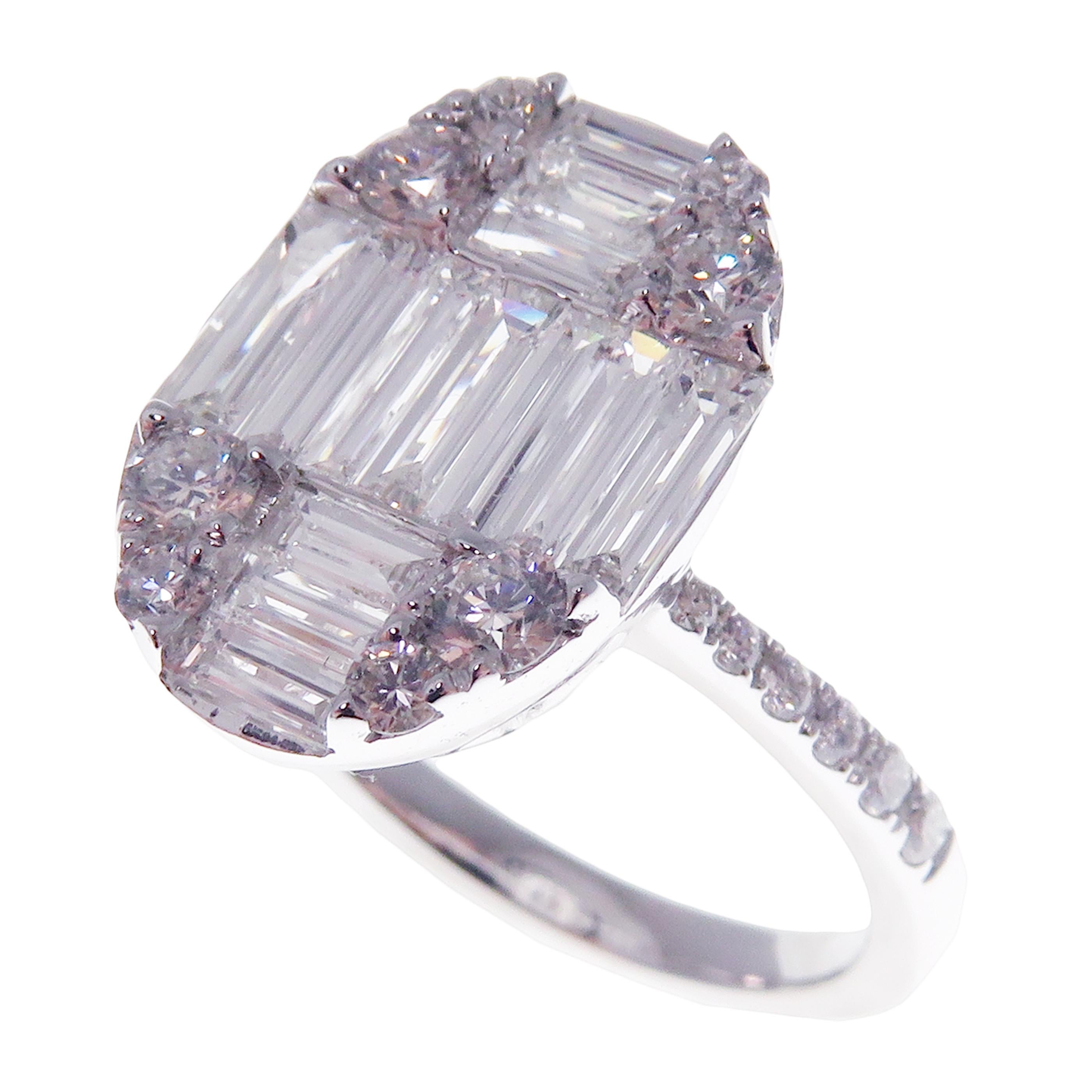 This baguette, diamond ring is crafted in 18-karat white gold, weighing approximately 1.77 total carats of SI-V Quality white diamonds. This ring is comfortable and can be sized 