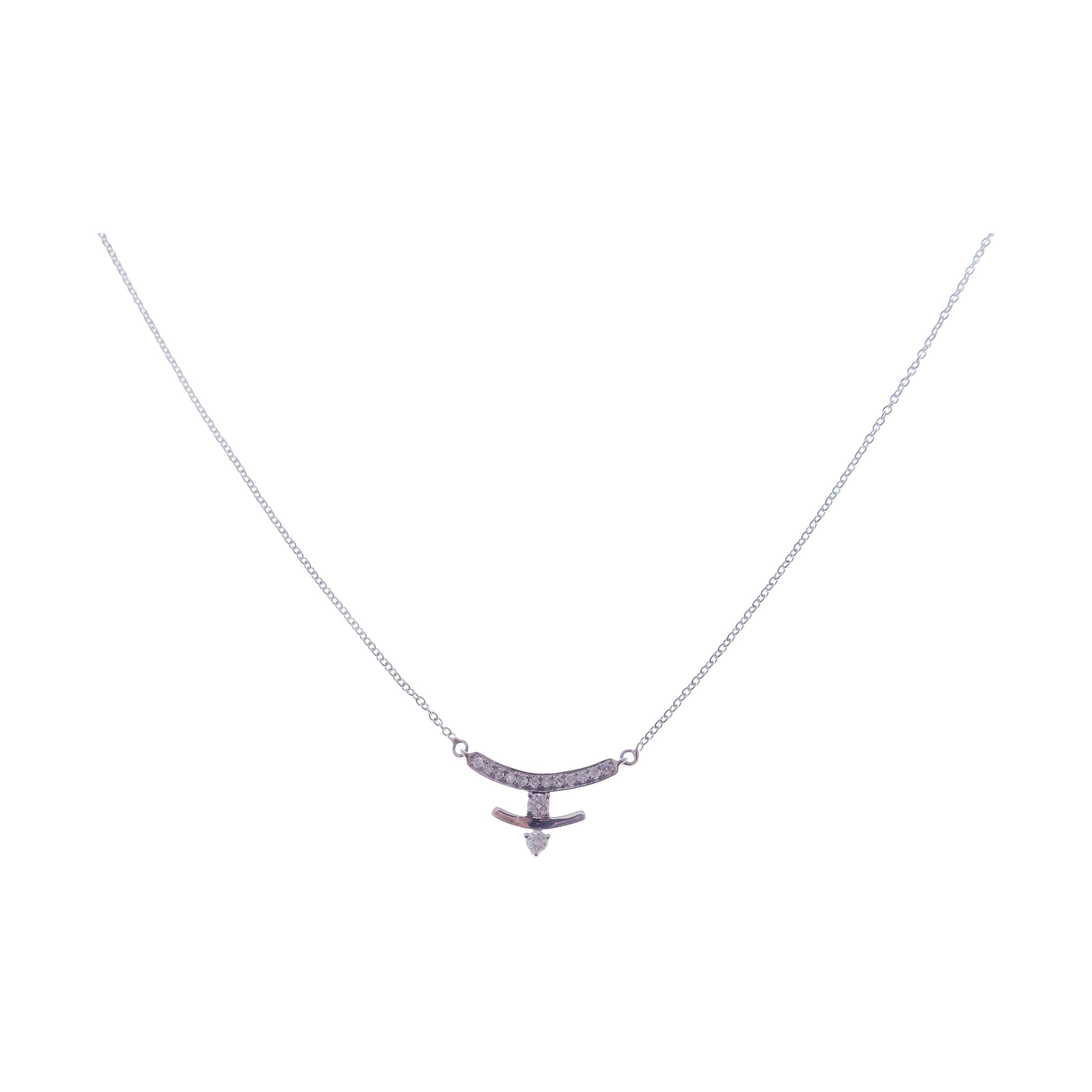 This bent necklace is crafted in 18-karat white gold, weighing approximately 0.09 total carats of SI-H Quality white diamond. 

Necklace is 16
