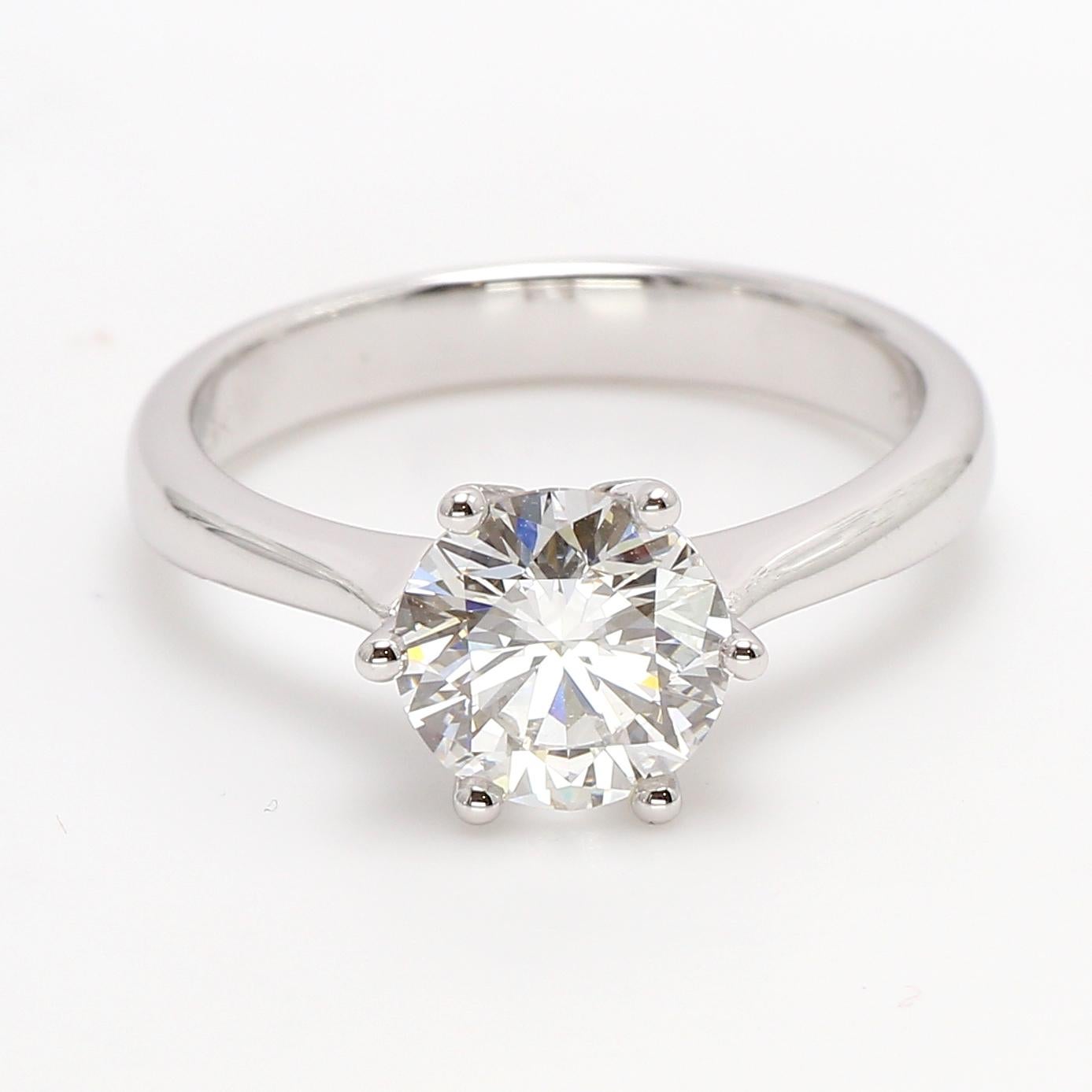 Beautifully crafted 18 Karat White Gold Solitaire Engagement Ring.
Round Brilliant Cut Shimansky White diamond 1.568ct  E color and VS1 clarity.
6 Prong Solitaire. EGL South Africa Certified Diamonds
Ring Size 6 (USA) can be sized 2 up or down and