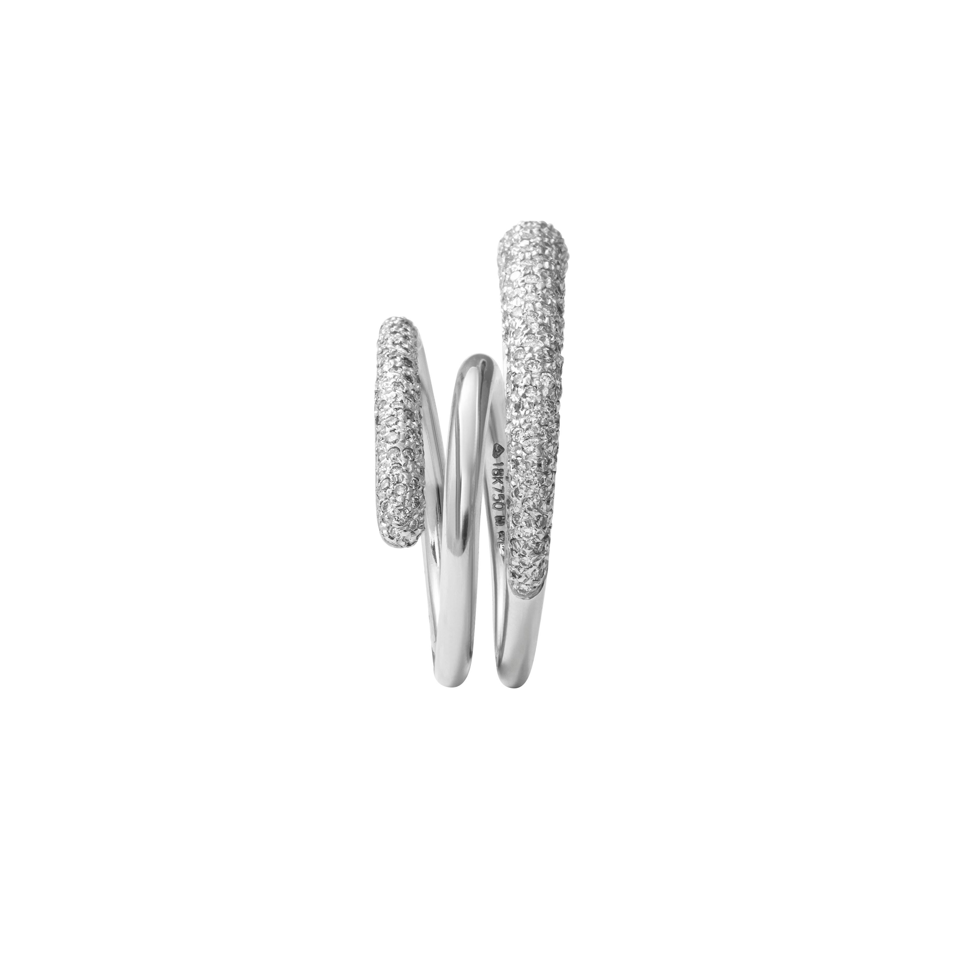 18 Karat White Gold Diamond Spiral Ring

This funky and one of a kind spiral designed ring set in 18 karat white gold, studded with vvs-vs quality diamonds is sure to turn heads! Unique and trendy it is perfect for evening wear, especially