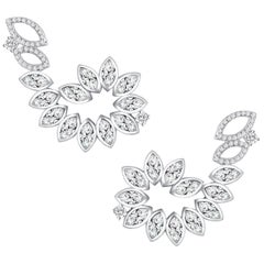 18 Karat White Gold Diamond Swirl Earrings