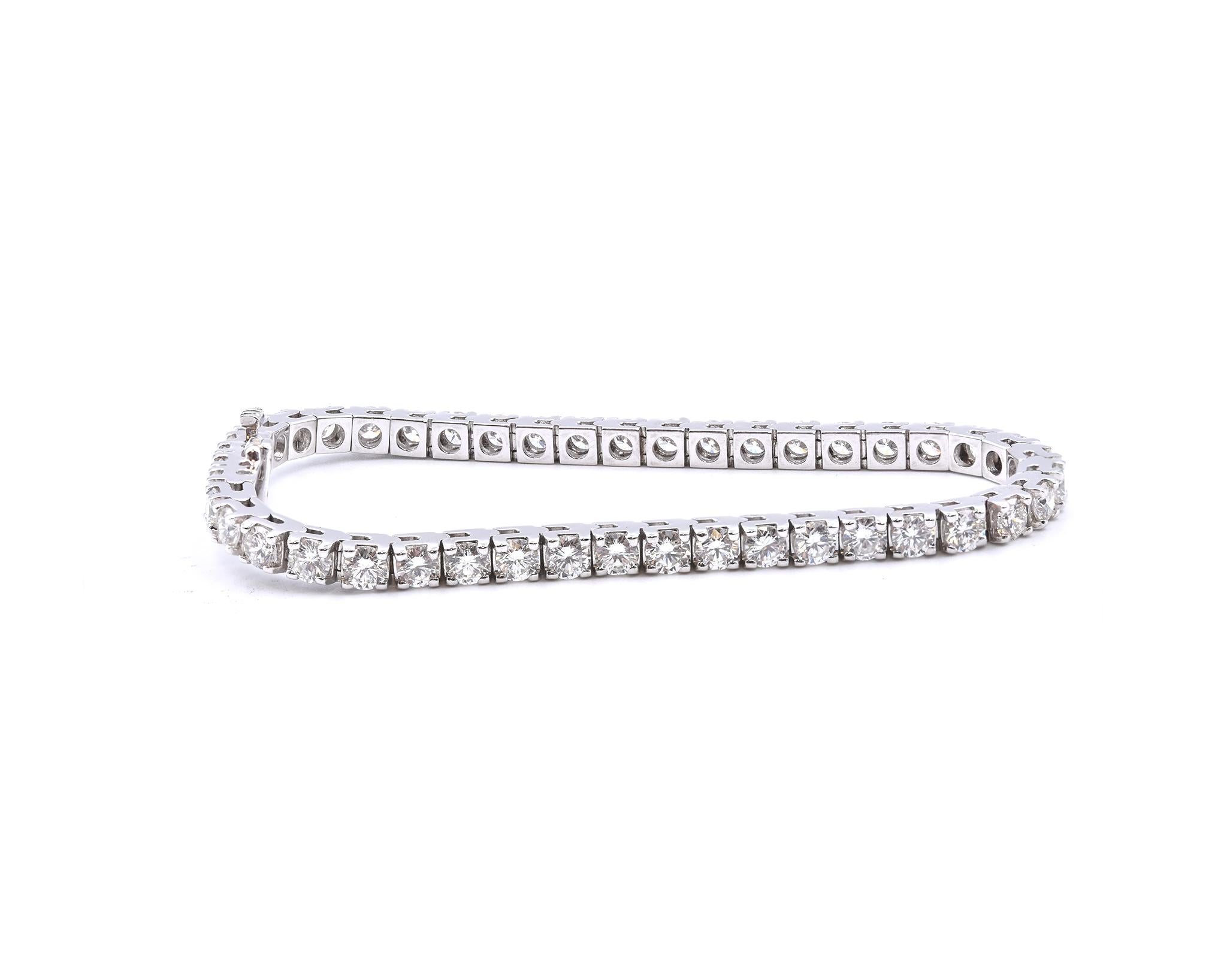 Material: 18K white gold 
Diamonds: 44 round brilliant cut = 7.50cttw
Color: G
Clarity: VS2
Dimensions: bracelet will fit up to a 7-inch wrist
Weight: 19.65 grams
