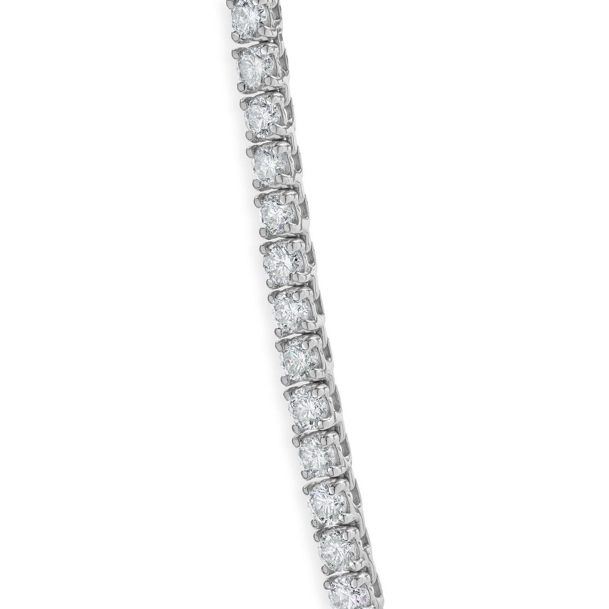 Designer: custom
Material: 18K white gold
Diamonds: 116 round brilliant cut = 12.00cttw
Color: F / G
Clarity: SI1-2
Dimensions: necklace measures 16.5-inches in length
Weight: 22.44 grams
