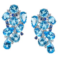 18 Karat White Gold Diamond Topaz and Sapphire Stud Earrings