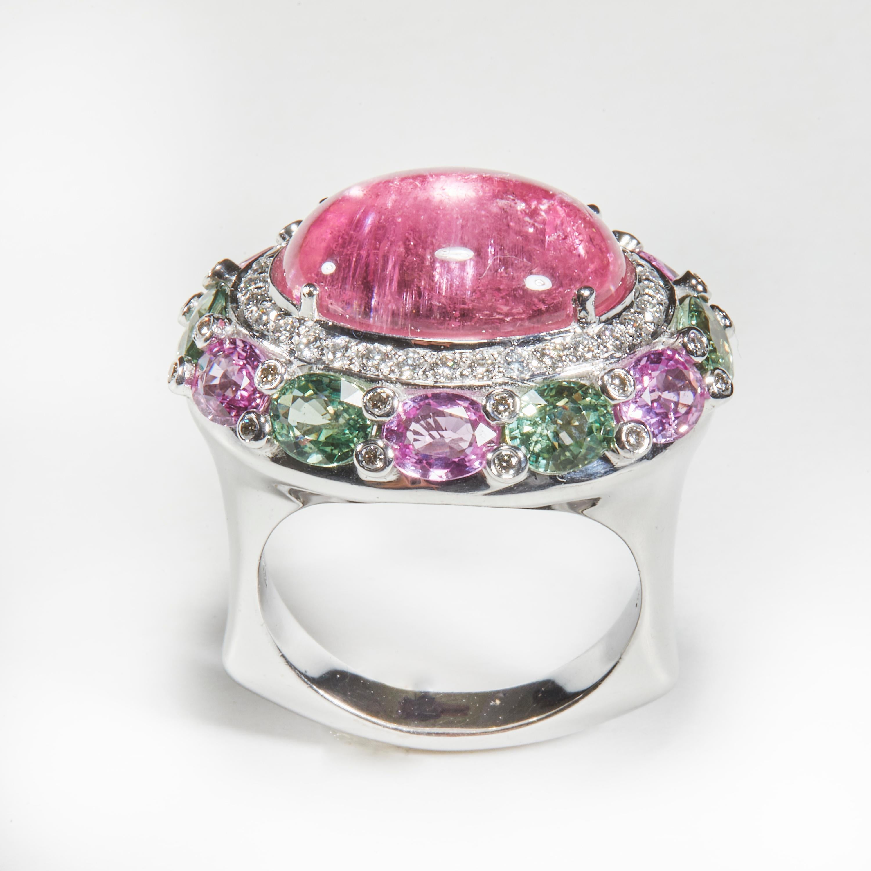 18 Karat White Gold Diamond, Tourmaline and Sapphire Cocktail Ring

56 Diamonds 0,54 Carat
1  Tourmaline 10,30 Carat
6 Sapphire green 2.60 Carat
6Sapphire Pink  2,33 Carat

Size EU 54 US 6.75


Founded in 1974, Gianni Lazzaro is a family-owned