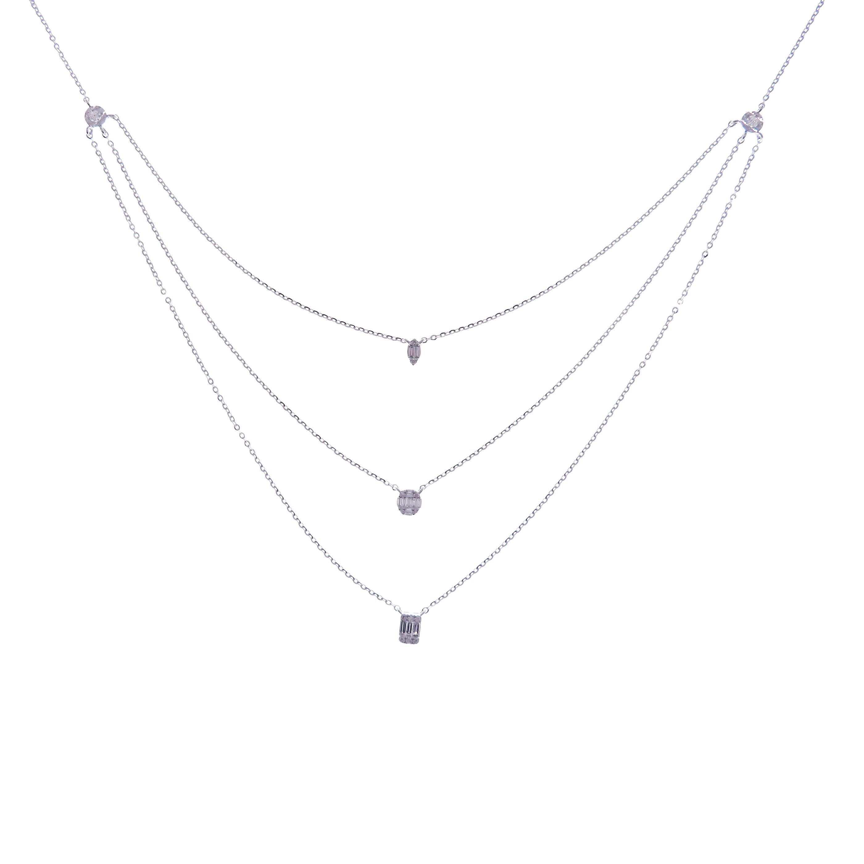 This casual triple strand necklace is crafted in 18-karat white gold, weighing approximately 0.43 total carats of SI Quality white diamond. 

Necklace is 16