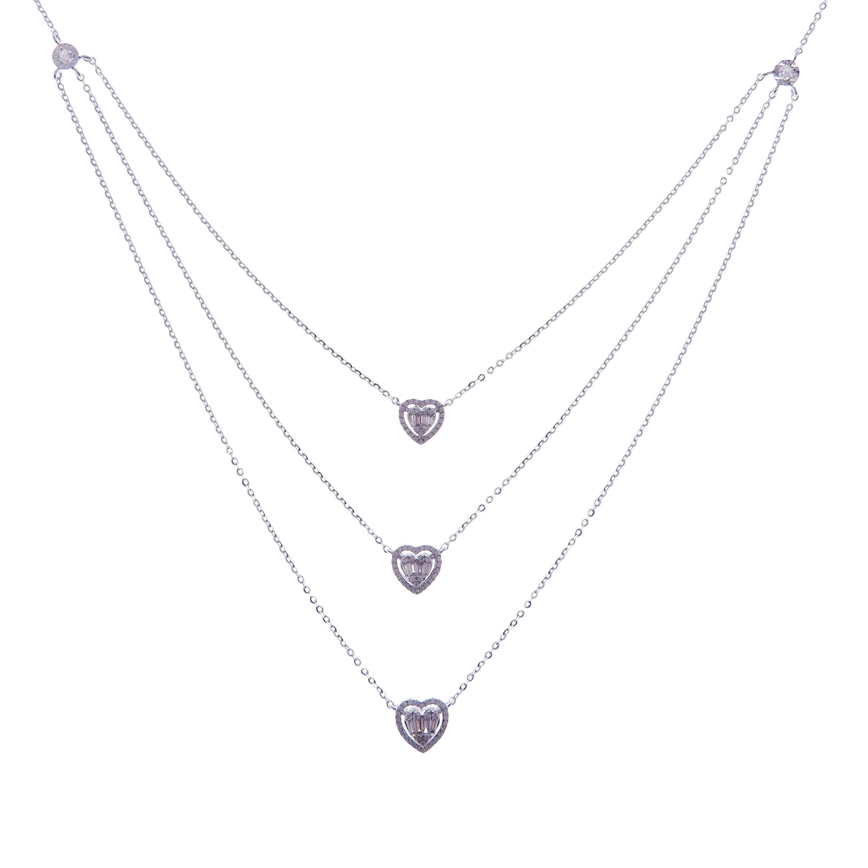 This triple sweet hearts necklace is crafted in 18-karat white gold, weighing approximately 0.61 total carats of SI Quality white diamond. 

Necklace is 16