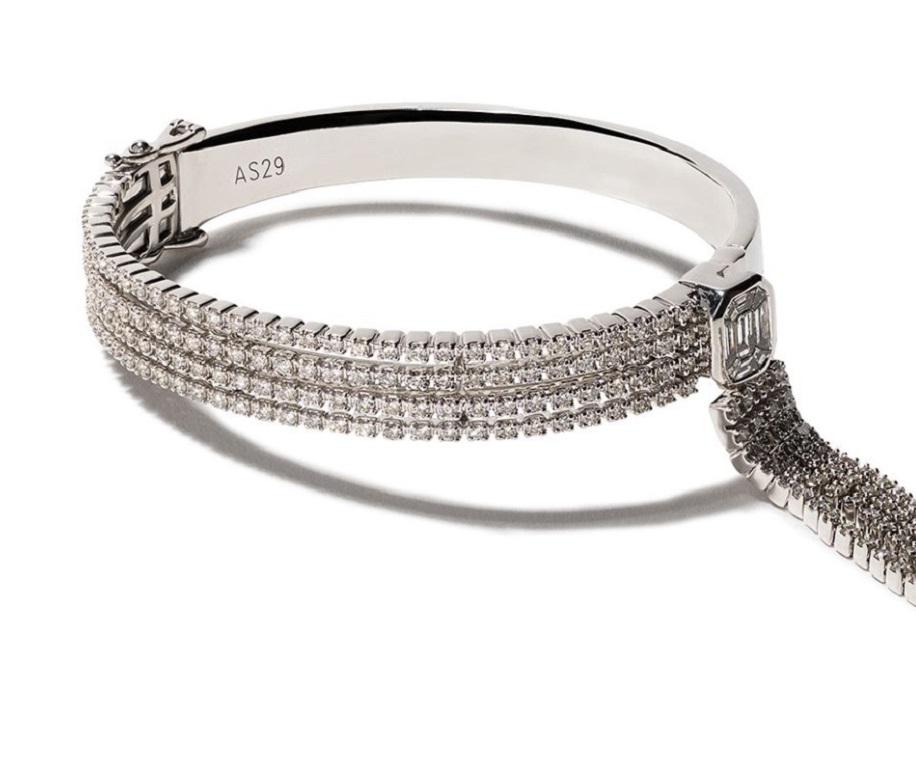 AS29 
18kt white gold diamond Venus illusion bangle

Offering modern women the perfect cure to diamond envy with a unique provocative take on fine jewellery, AS29 is all about being bold and feminine. Crafted from 18kt white gold and diamond Venus