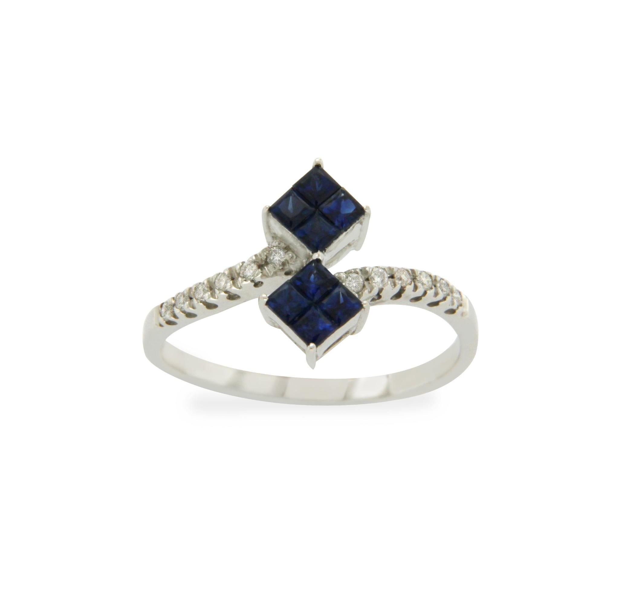 Type: Ring
Top: 11.8 mm
Band Width: 1.60 mm
Metal: White Gold
Metal Purity: 18K
Size:6.5
Hallmarks: 18K
Total Weight: 2.5 Gram
Stone Type: 0.10 CT Diamonds & .85 CT Sapphire
Condition: New
Stock Number: N120
