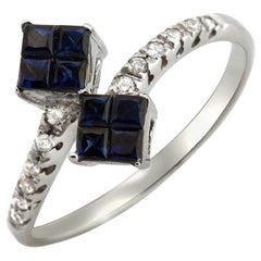 18 Karat White Gold Diamonds and Sapphire Engagement Ring