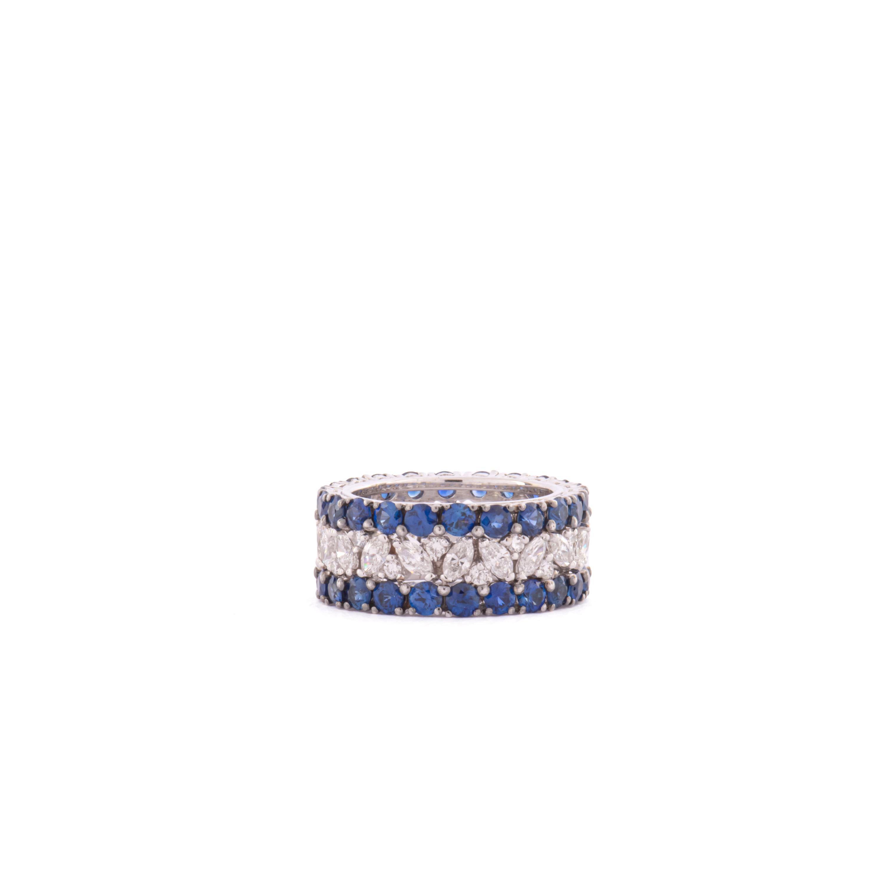 Lovely 18 Kt white gold ring featuring diamonds, brilliant cut  ct. 0.36, brilliant shuttles ct. 1.60 and blue sapphires ct 4.23.

Size 12 Italian