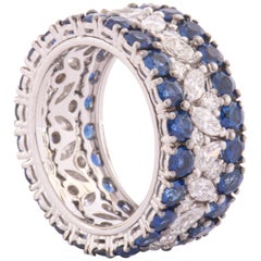 Bague jonc en or blanc 18 carats, diamants et saphirs