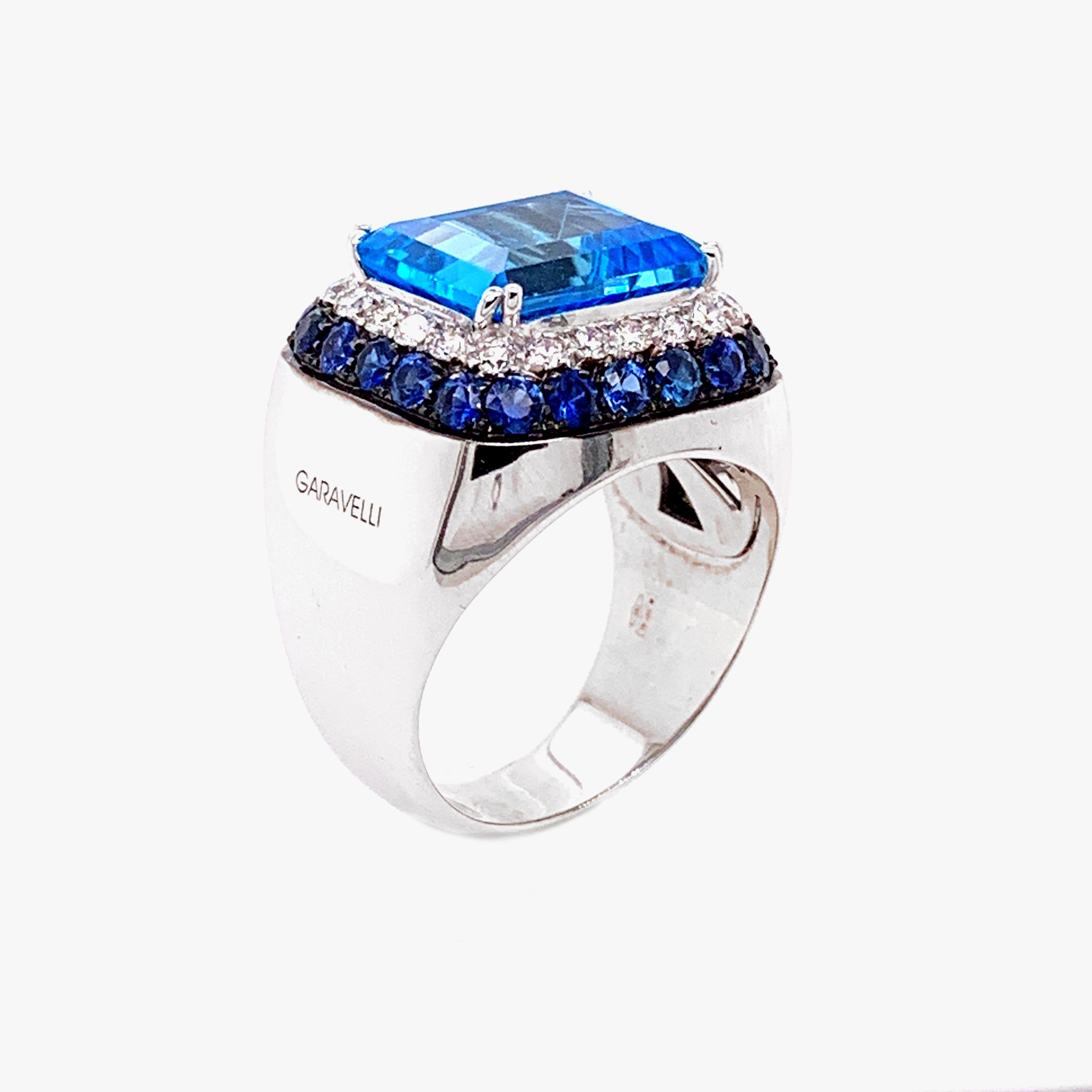 18 Karat White Gold Diamonds, Blue Sapphires and Blue Topaz Ring, finger size 55
18kt White gold gr: 14,90
White Diamonds ct 0.56
Blue Sapphires ct 1.54
Blue Topaz ct 7.70