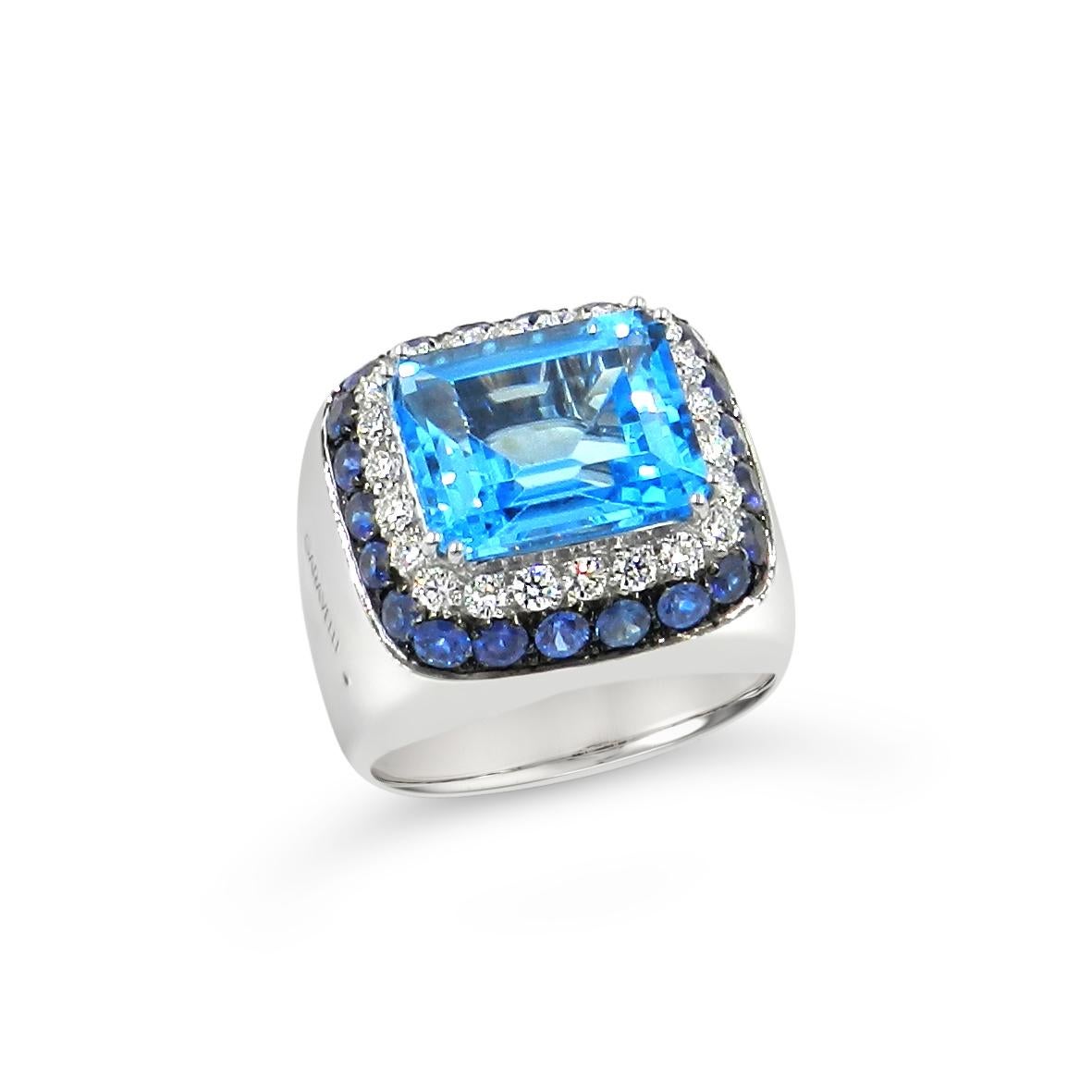 Round Cut 18 Karat White Gold Diamonds, Blue Sapphires and Blue Topaz Ring