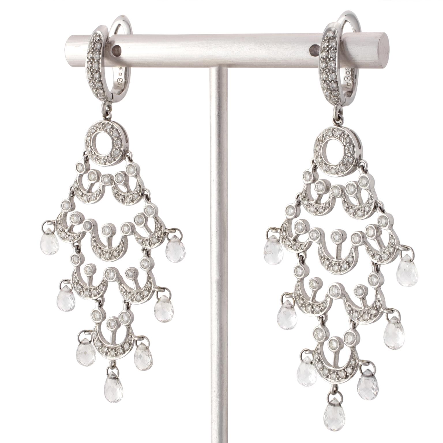 Chandelier earrings in 18 Karat white gold set with 186 round brilliant and briolette cut diamonds, totalling 9.15 carats in weight.
Length: 7 cm (2.76 in)
Width: 27 mm (1.06 in)
