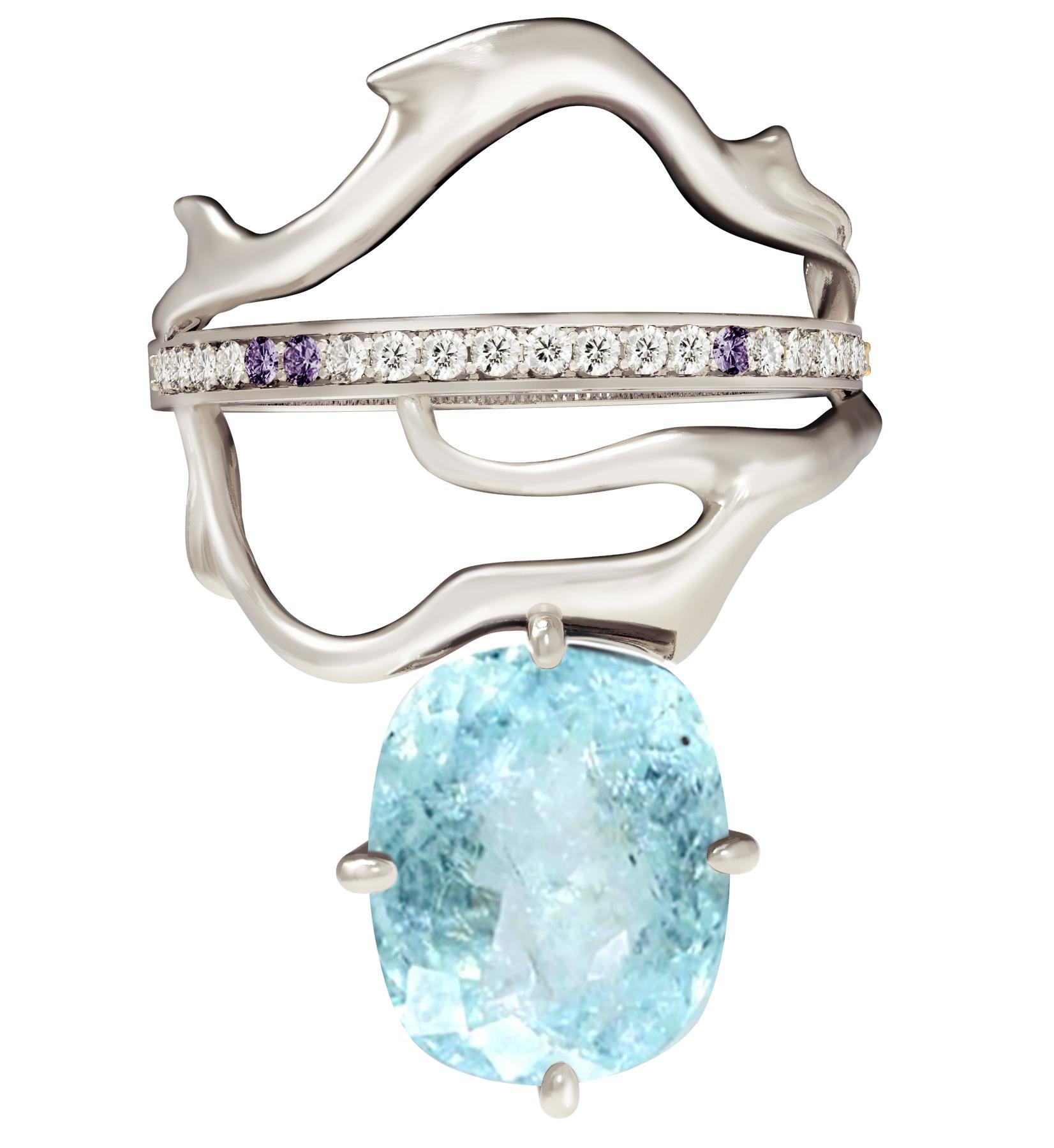This Tibetan 18 karat white gold contemporary fashion ring is encrusted with diamonds, amethysts and oval cut paraiba tourmaline  (neon copper bearing, 2,4 carats, blue with inclusions). Size is custom made. It was inspired by Tibetan culture,