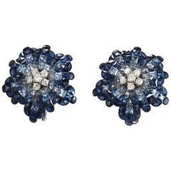 18 Karat White Gold Diamonds Invisible Set 34.26 Carat Blue Sapphire Earrings