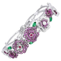 Bracelet à fleurs en or blanc 18 carats, diamants, saphirs roses, rubis et tsavorite