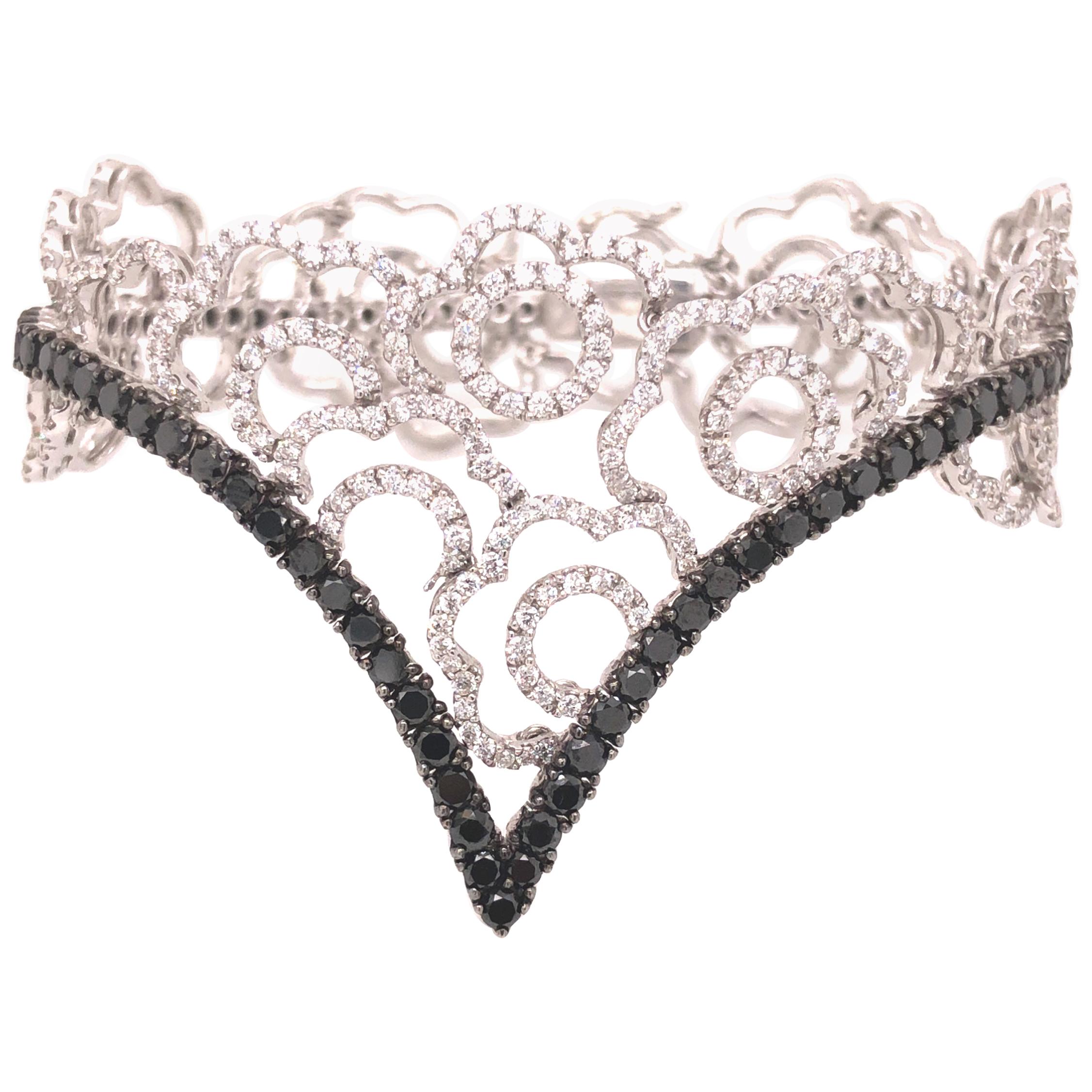 18 Karat White Gold Dimond and Black Diamond Floral Bracelet For Sale