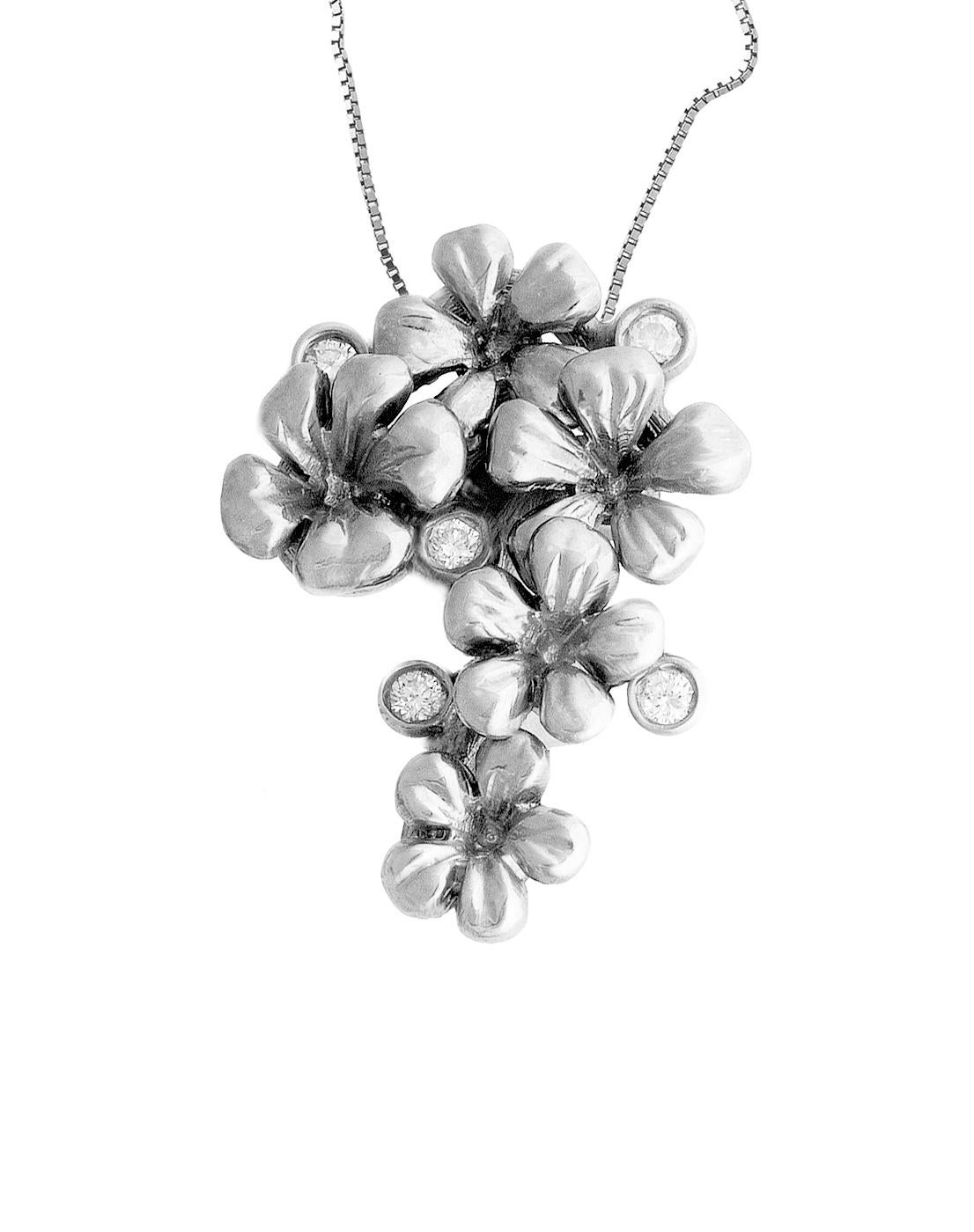 The 18 karat white gold Plum Blossom Pendant Necklace features 5 round natural diamonds and a detachable natural quartz (13 mm). This jewelry collection has been featured in Vogue UA and Harper's Bazaar reviews. The diamonds are top quality natural