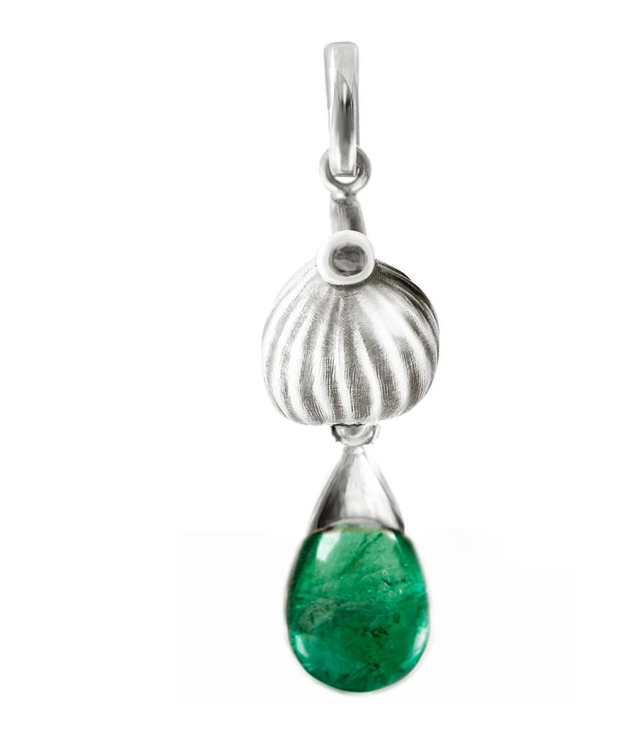 This contemporary drop pendant necklace is made of 18 karat white gold and features a natural emerald that measures 9.5x7x6 mm and weighs 2.79 carats, as well as a round diamond. The Fig collection was featured in a review by Vogue UA and was