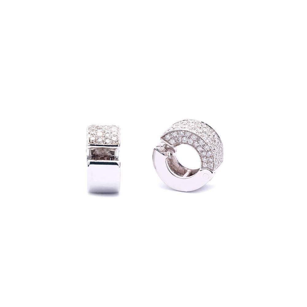 Beautiful and bright 18 Karat white gold hoop earring studded with 2,70 ct. of brilliant cut diamonds. 