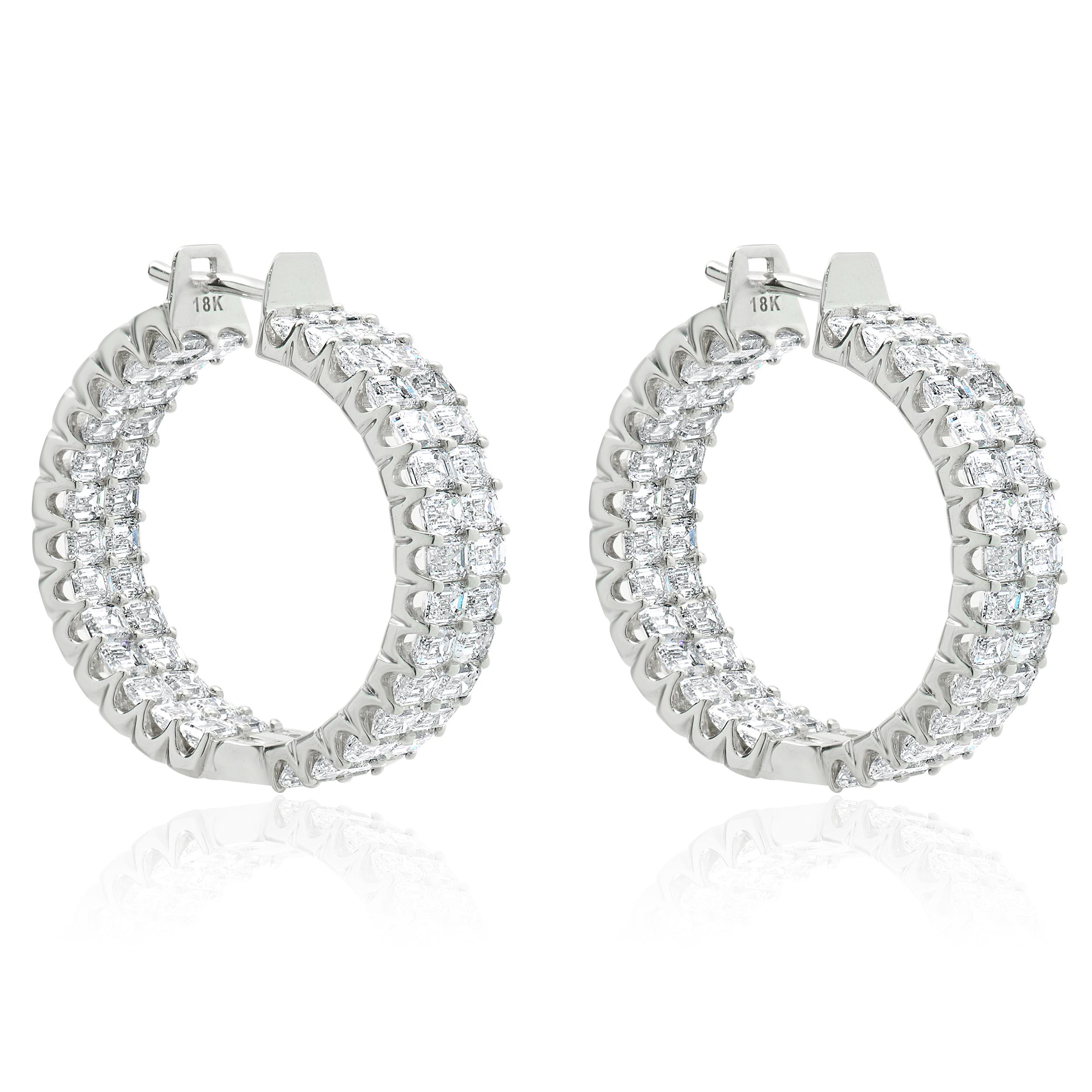 Designer: custom
Material: 18K White gold
Diamond: 112 emerald cut = 11.27cttw
Color: F/G
Clarity: VS1-2
Dimensions: earrings measure 1-inche in length
Weight: 16.82 grams