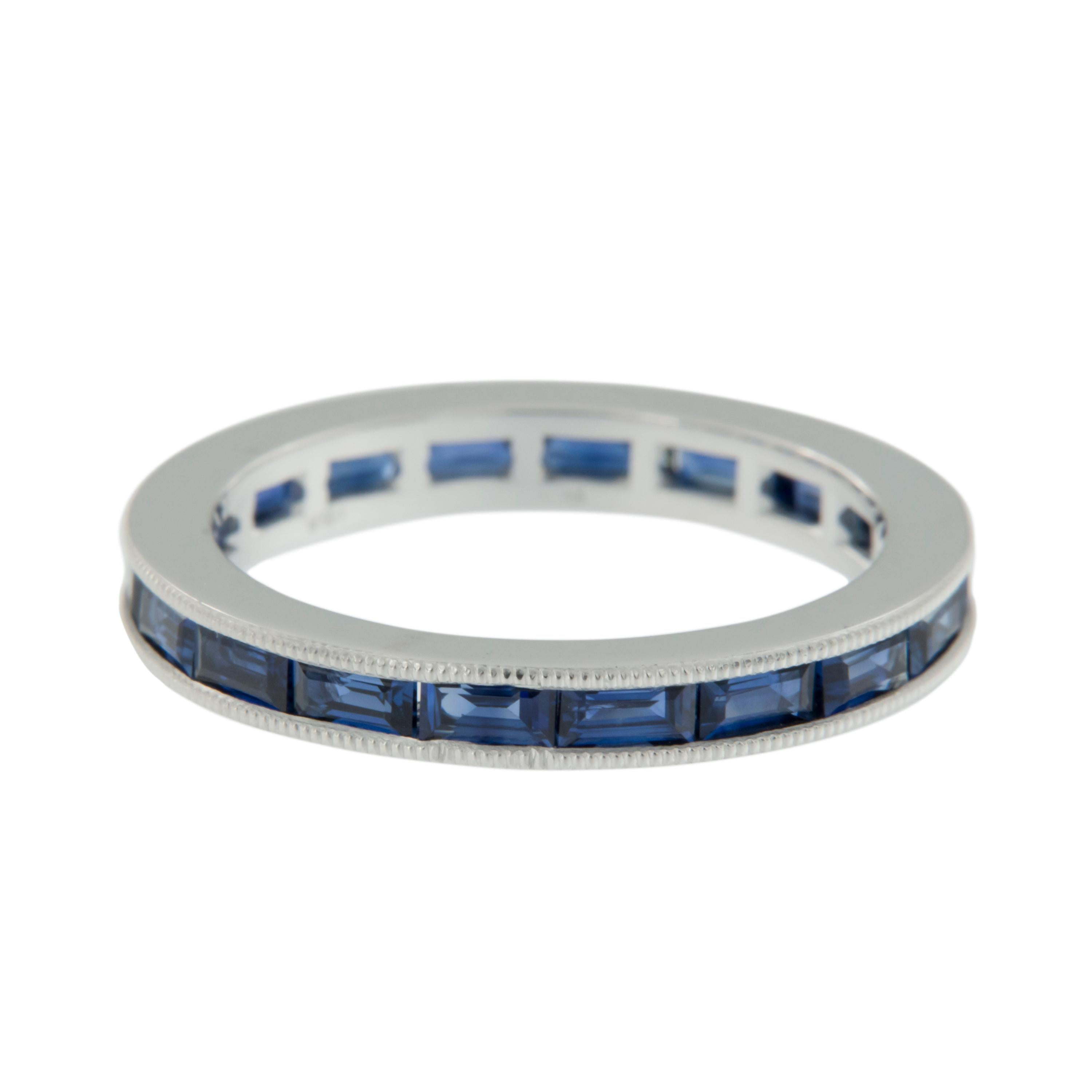 Expertly crafted in 18 karat white gold this timeless baguette cut blue sapphire eternity band is a perfect addition to an existing engagement ring, for wearing alone and also looks fantastic stacked! 18 baguette cut fine quality blue sapphires