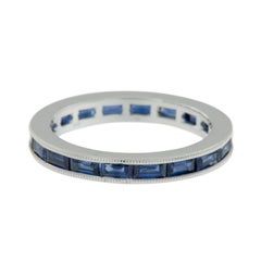 18 Karat White Gold East-West Style Baguette Blue Sapphire Eternity Band Ring