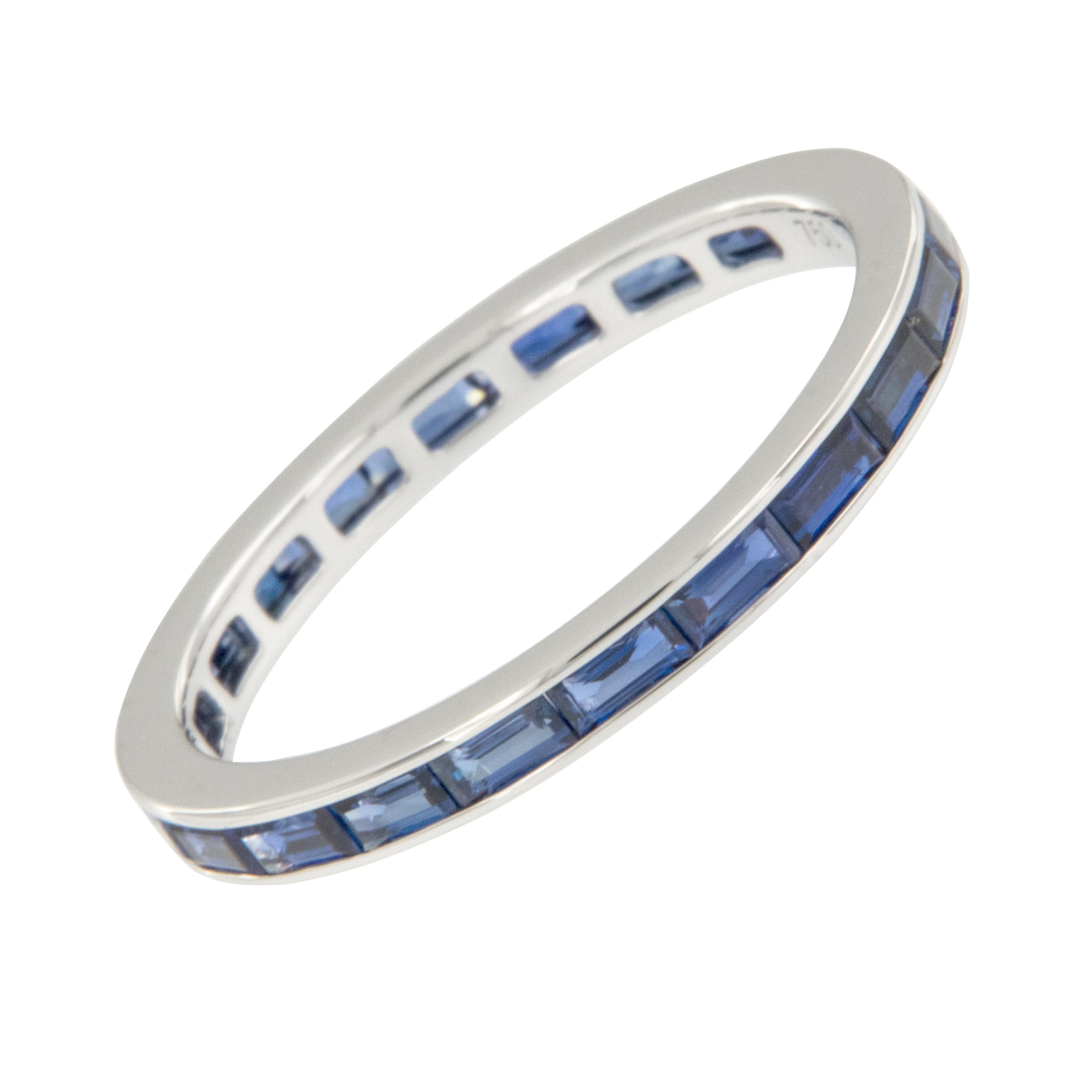 Expertly crafted in rich 18 karat white gold this timeless baguette cut blue sapphire eternity band is a perfect addition to an existing engagement ring, for wearing alone and also looks fantastic stacked! 20 baguette cut fine quality blue sapphires