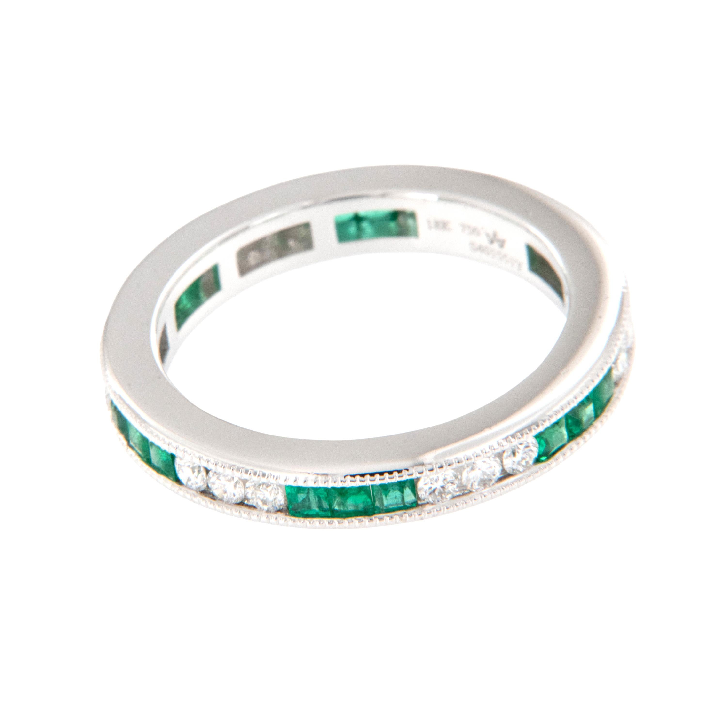 Brand new and made for CAMPANELLI & PEAR this Art Deco inspired band boasts 0.58 Cttw square step cut lively green emeralds and 0.38 Cttw round brilliant fine diamonds channel set in alternating sections of three for a truly unique look. The clean