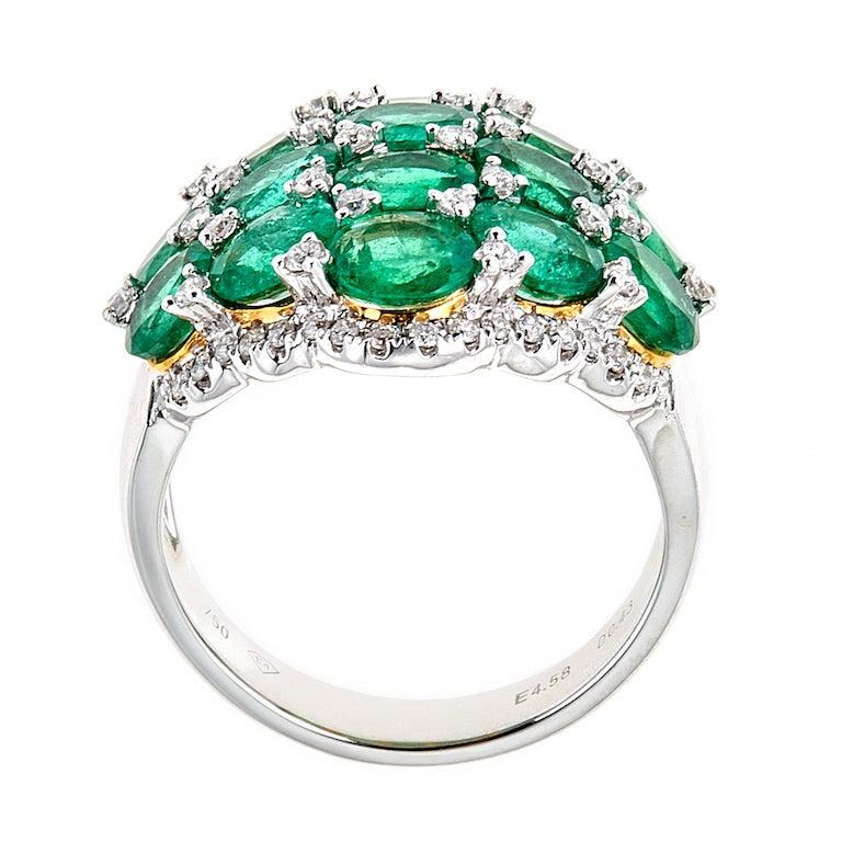 Contemporary 4.58 ct Oval Shaped Emerald and Diamond Accent Cluster Ring in 18 kt White Gold For Sale