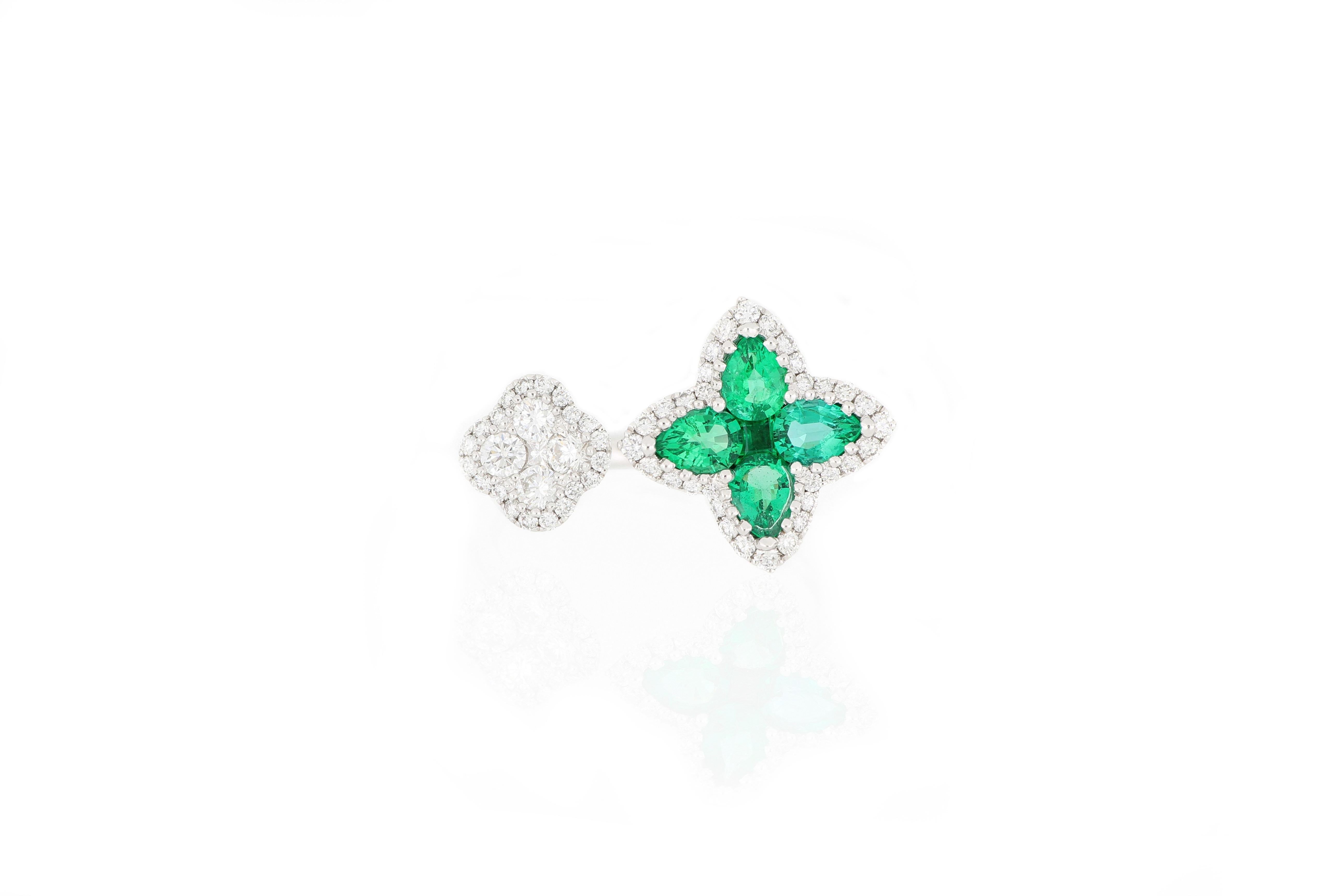Contemporary 18 Karat White Gold Emerald and Diamond Flower Ring For Sale