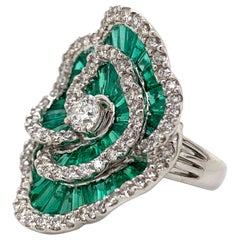 Used 18 Karat White Gold Emerald and Diamond Flower Ring