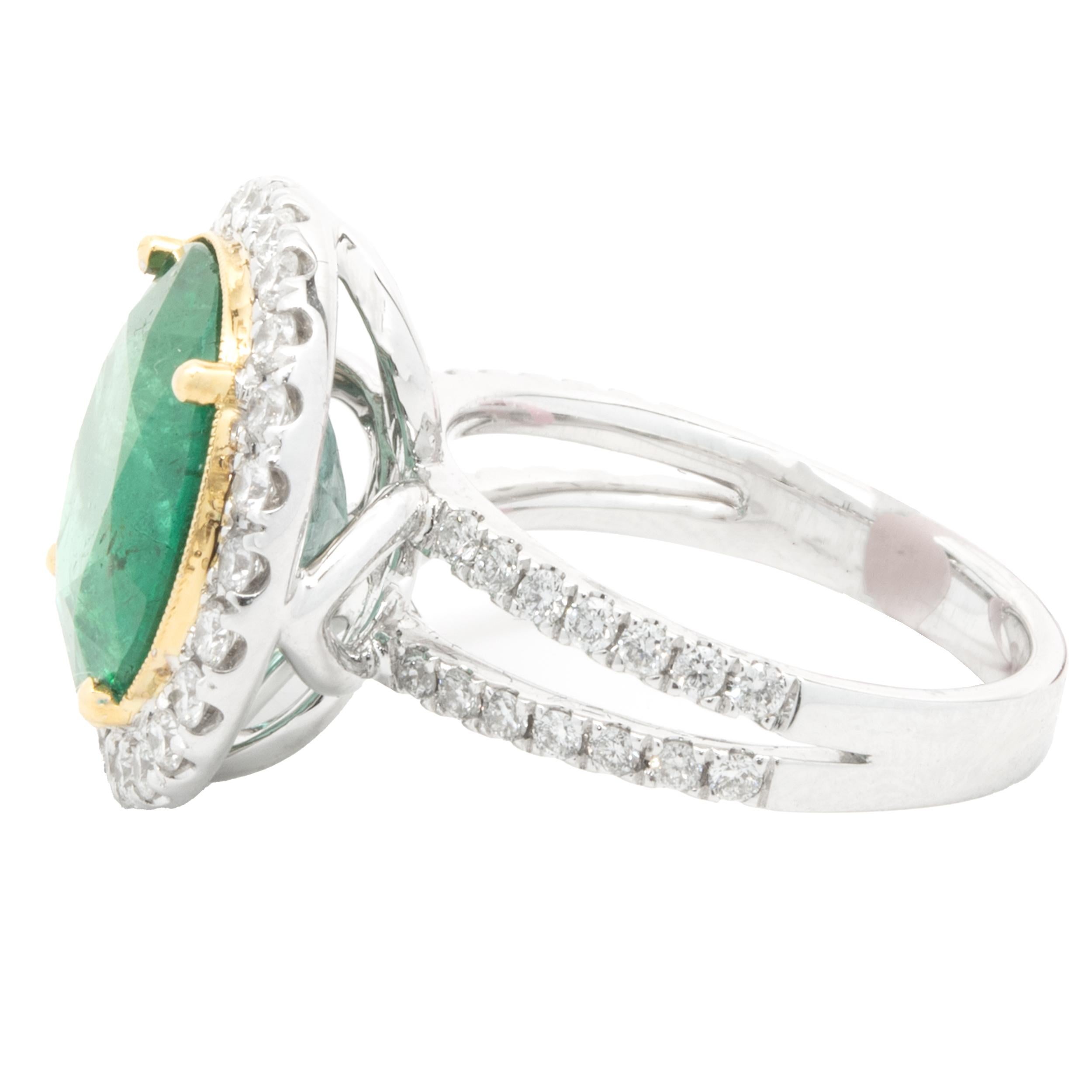 Designer: custom
Material: 18K white and yellow gold
Diamond: 52 round brilliant cut = 0.88cttw
Color: G
Clarity: VS1-2
Emerald: 1 round cut = 7.73ct
Ring Size: 6 (complimentary sizing available)
Weight: 9.06 grams