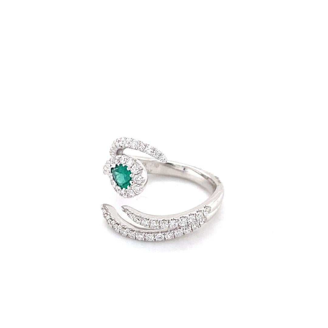 Pear Cut 18 Karat White Gold Emerald and Diamond Ring For Sale