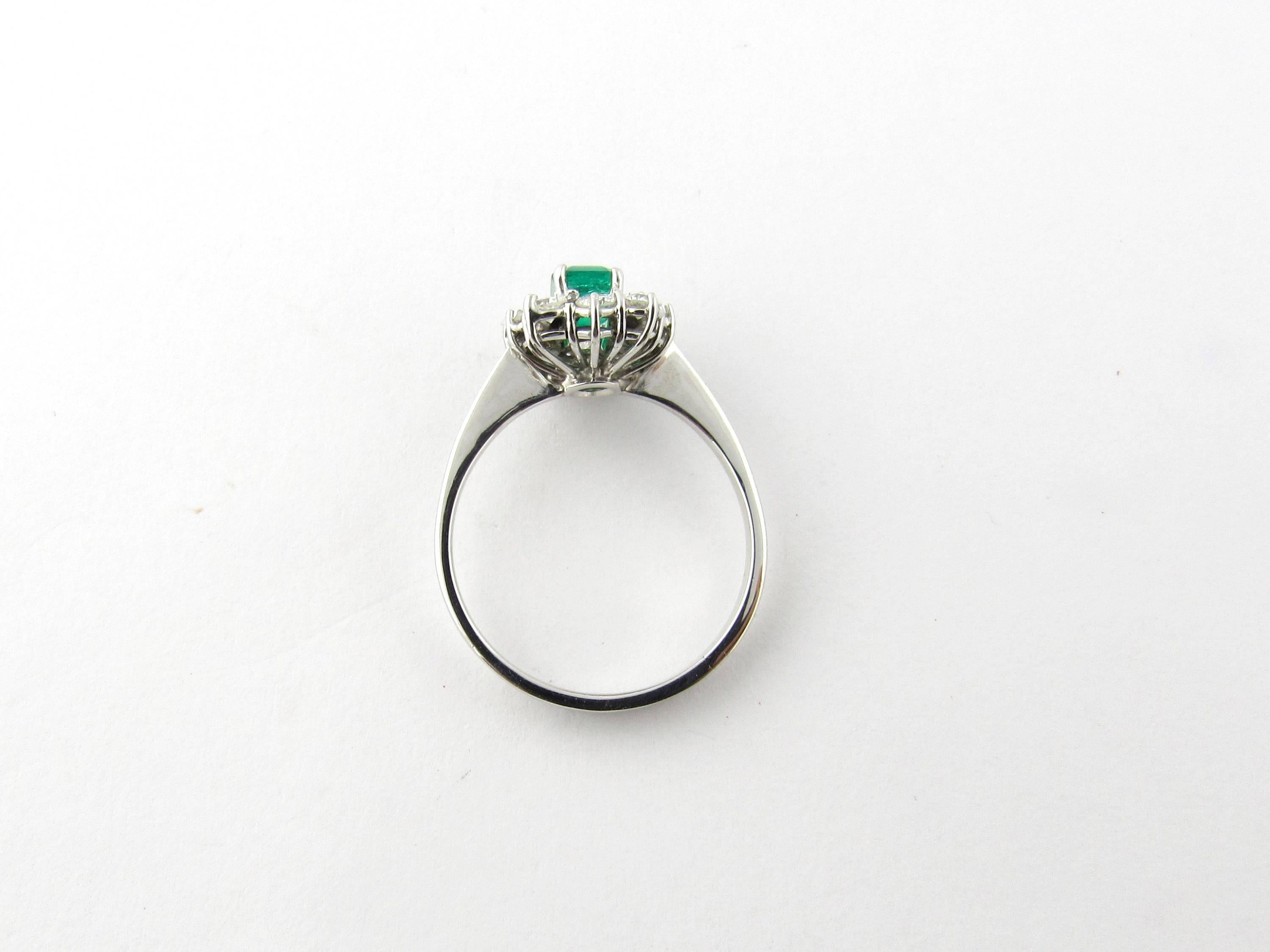 Women's 18 Karat White Gold Emerald and Diamond Ring