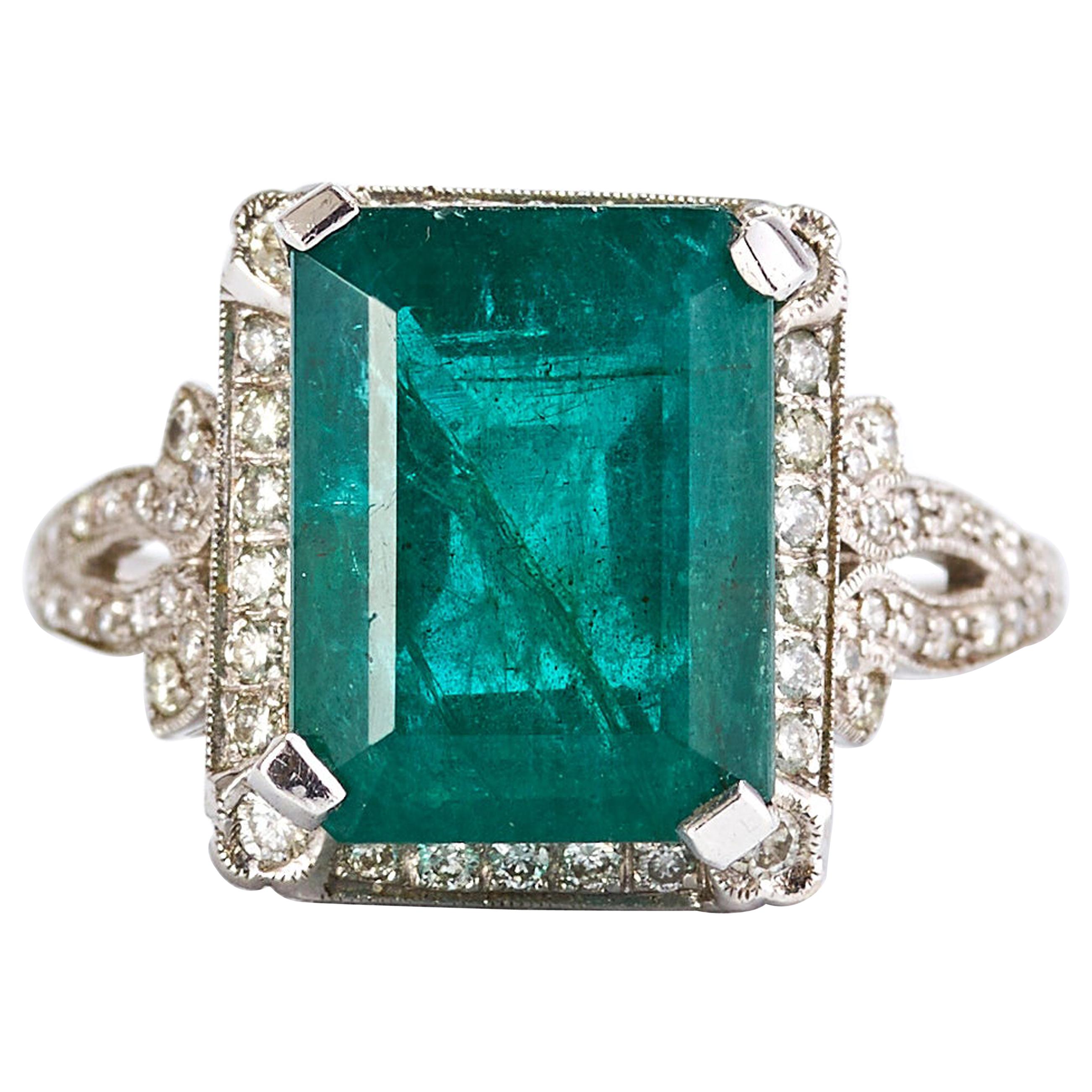18 Karat White Gold Emerald and Diamond Ring For Sale