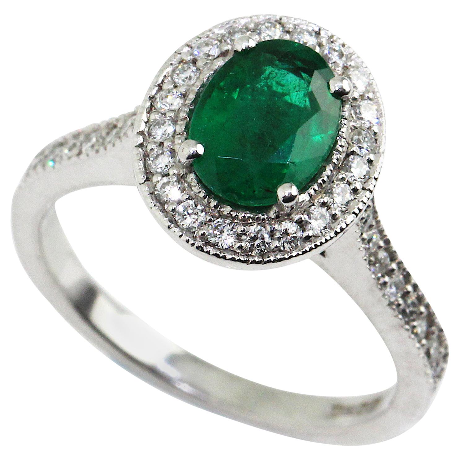 18 Karat White Gold Emerald and Diamond Ring For Sale