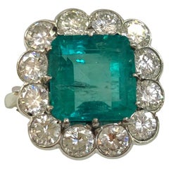 Retro 18 Karat White Gold Emerald and Diamond Ring