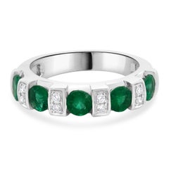 18 Karat White Gold Emerald and Diamond Station Band