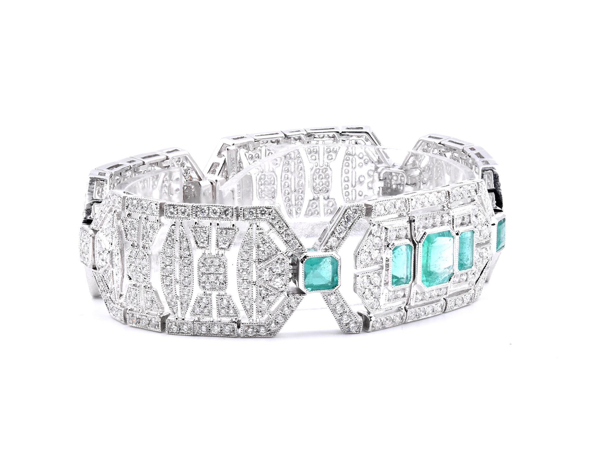 Material: 18K white gold
Diamonds:  651 round cut = 6.16cttw
Color: G
Clarity: VS
Emeralds: 5 multi cut = 3.53cttw
Color: Medium Green
Dimensions: bracelet will fit up to a 7-inch wrist and measures 18.75mm in width 
Weight: 45.90 grams
