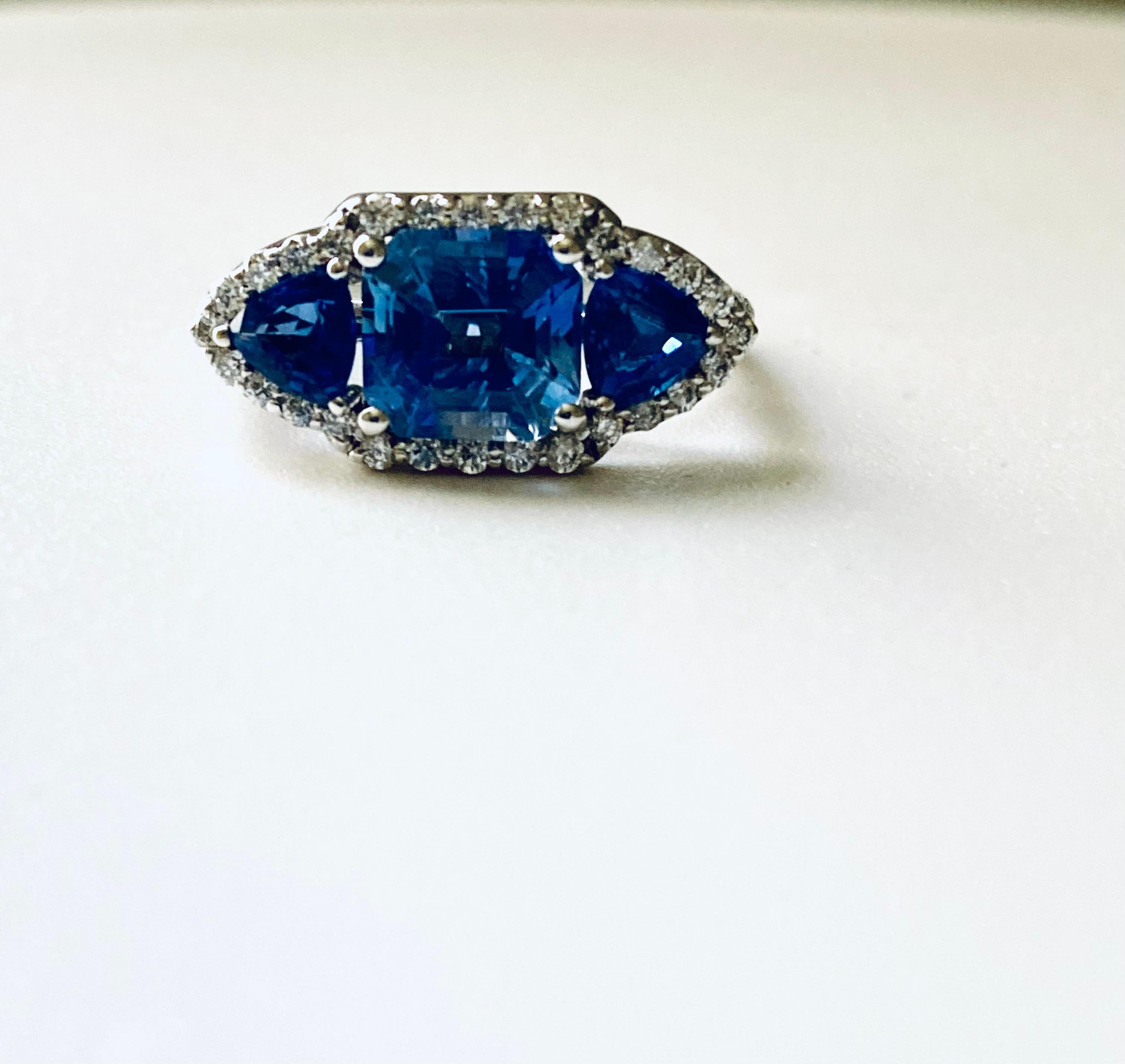 Women's or Men's 18 Karat White Gold Emerald Cut Ceylon Sapphire Diamond Trillion Sapphires Ring 