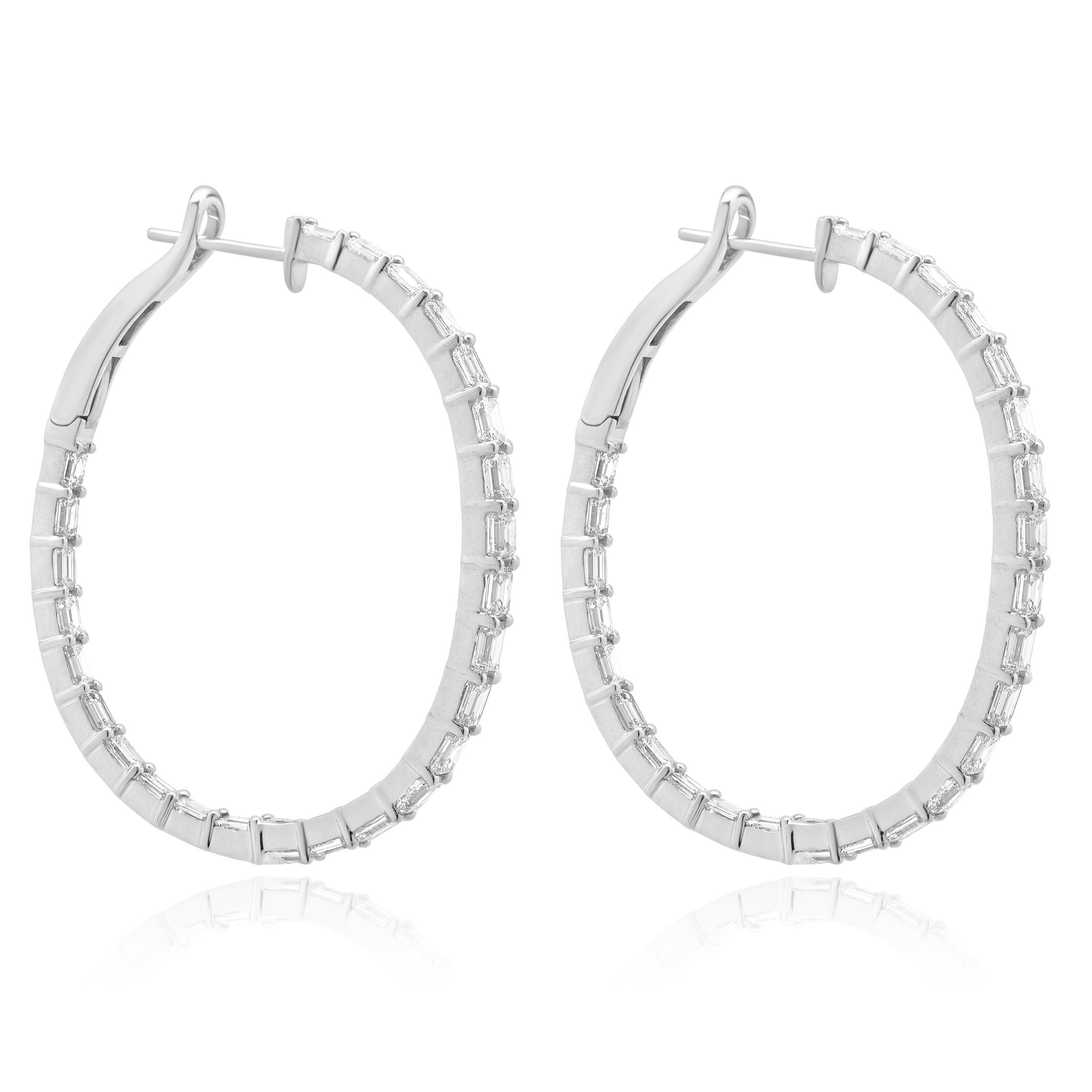 Designer: custom design
Material: 18K white gold
Diamonds: 52 emerald cut = 5.68cttw
Color: J / K
Clarity: VS1-2
Dimensions: earrings measure 42mm 
Weight: 10.82 grams