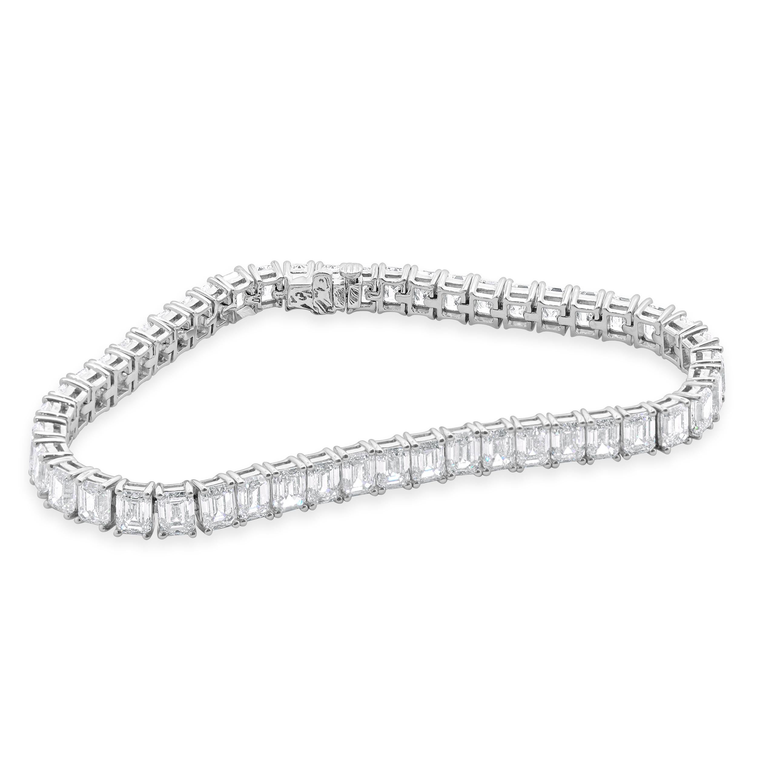 Designer: custom design
Material: 18K white Gold
Diamond: 48 emerald cut= 18.10cttw
Color: G
Clarity: VS
Dimensions: bracelet will fit up to a 7-inch wrist
Weight: 17.31 grams
