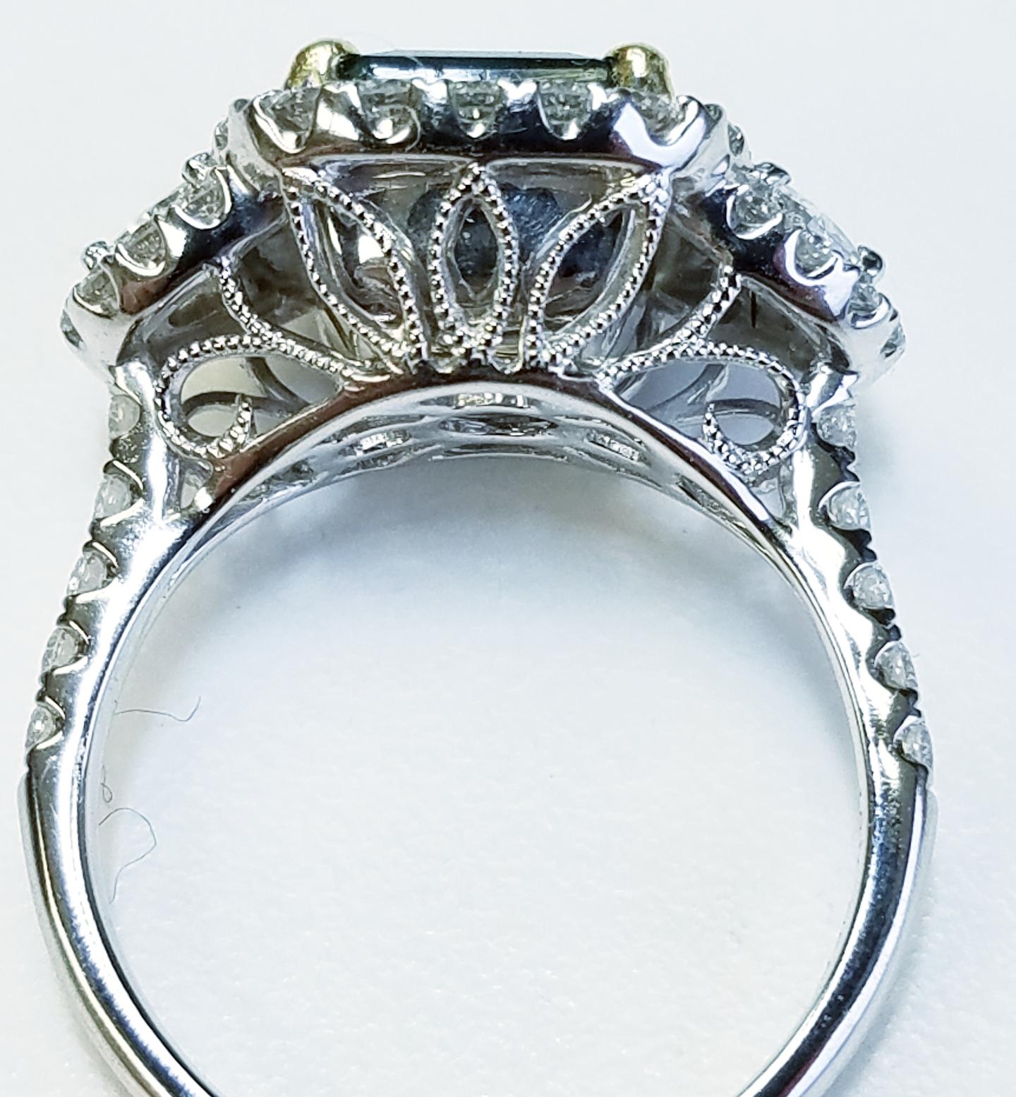 Contemporary 18 Karat White Gold Emerald Cut Emerald and Diamond Ring