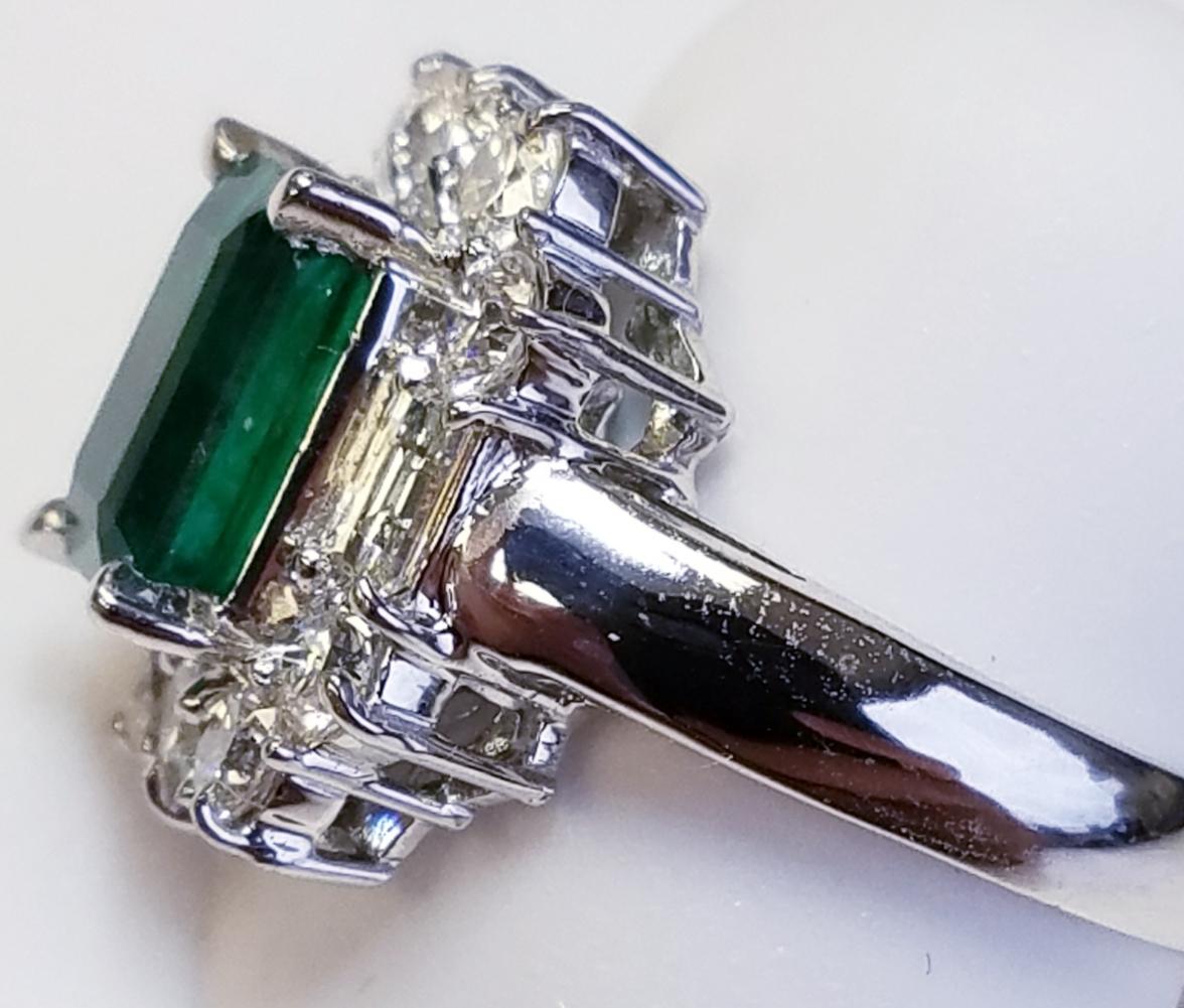 Contemporary 18 Karat White Gold Emerald Cut Emerald and Diamond Ring 17235